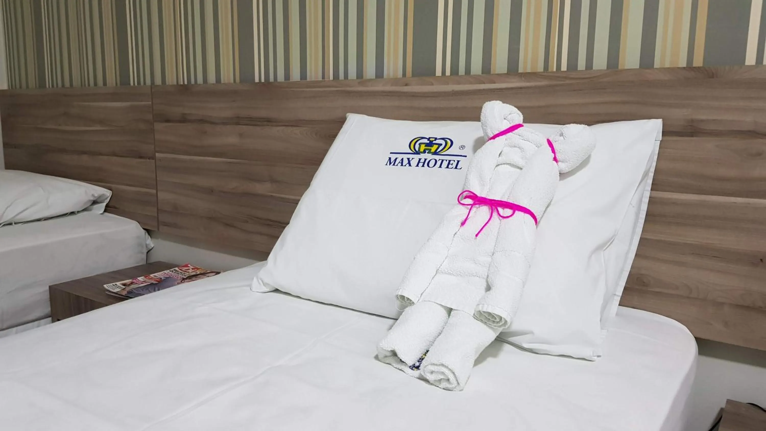 Bed in Max Hotel