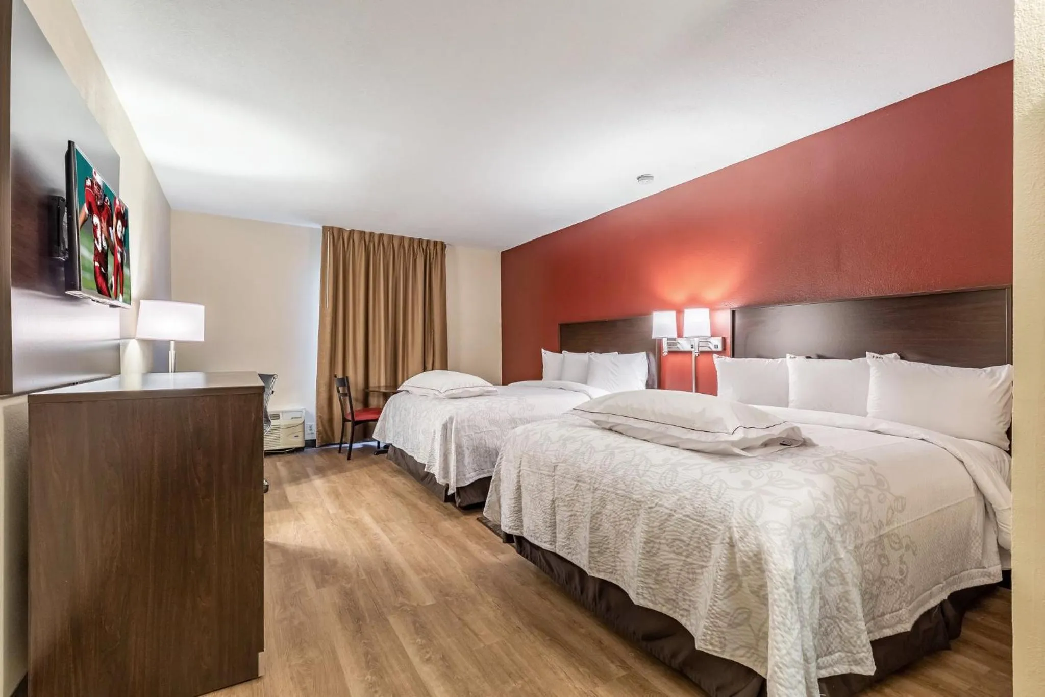 Photo of the whole room, Bed in Red Roof Inn PLUS & Suites Houston - IAH Airport SW