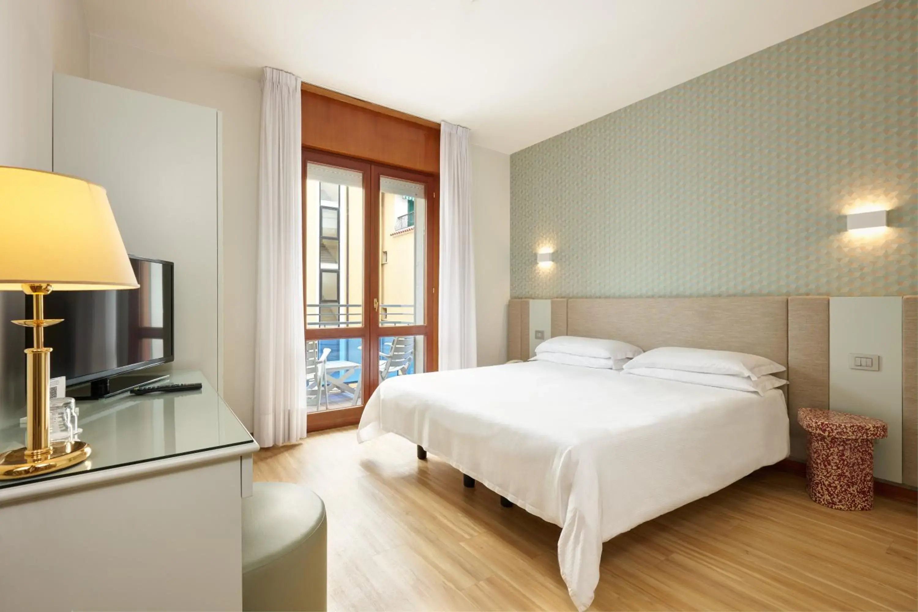 Family Room (2 Adults + 1 Child) in Hotel Croce Di Malta Family Room (2 Adults + 1 Child) in Hotel Croce Di Malta