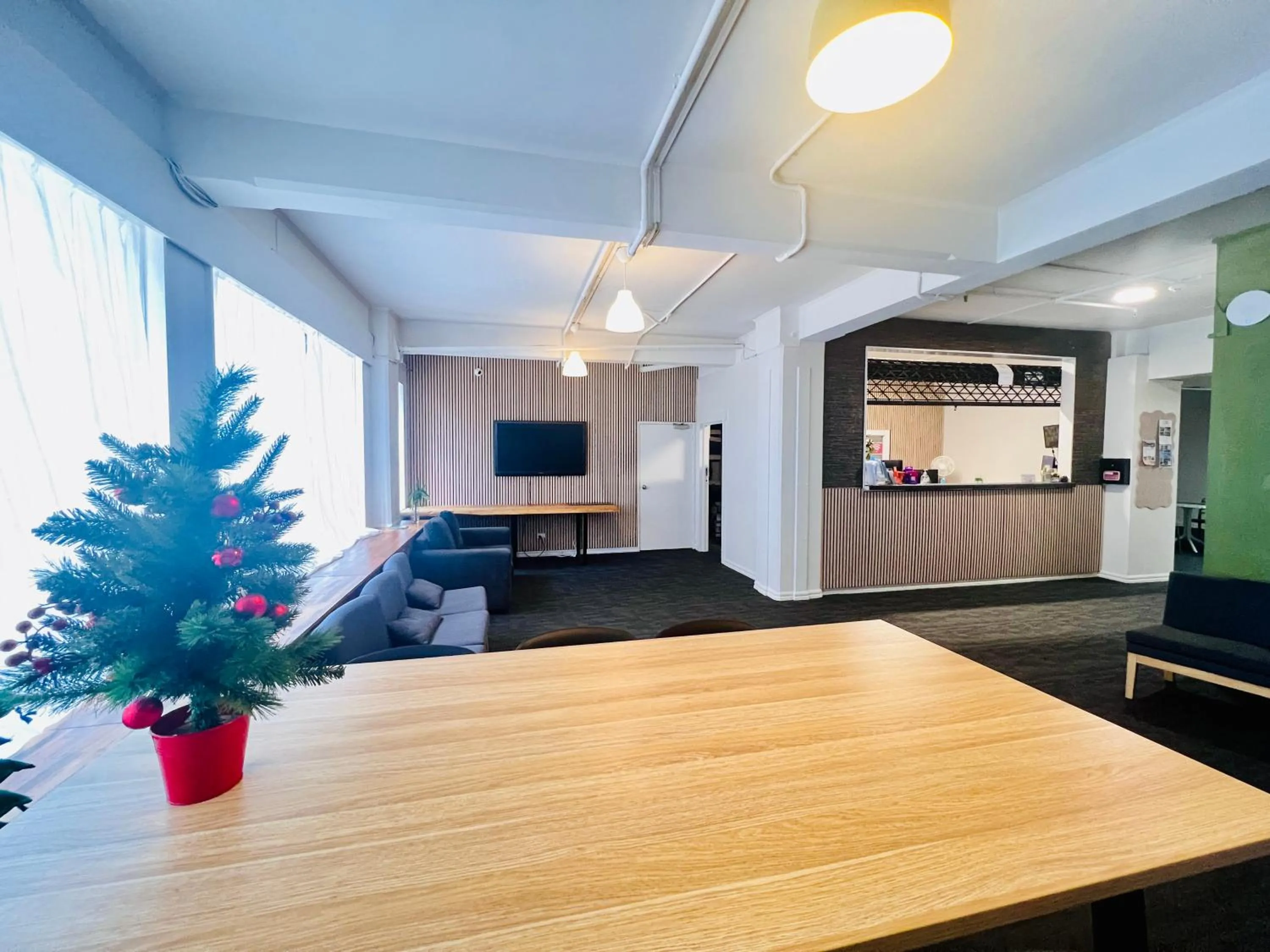 Communal lounge/ TV room in Utopia31 Hostel - formerly Frienz Backpacker