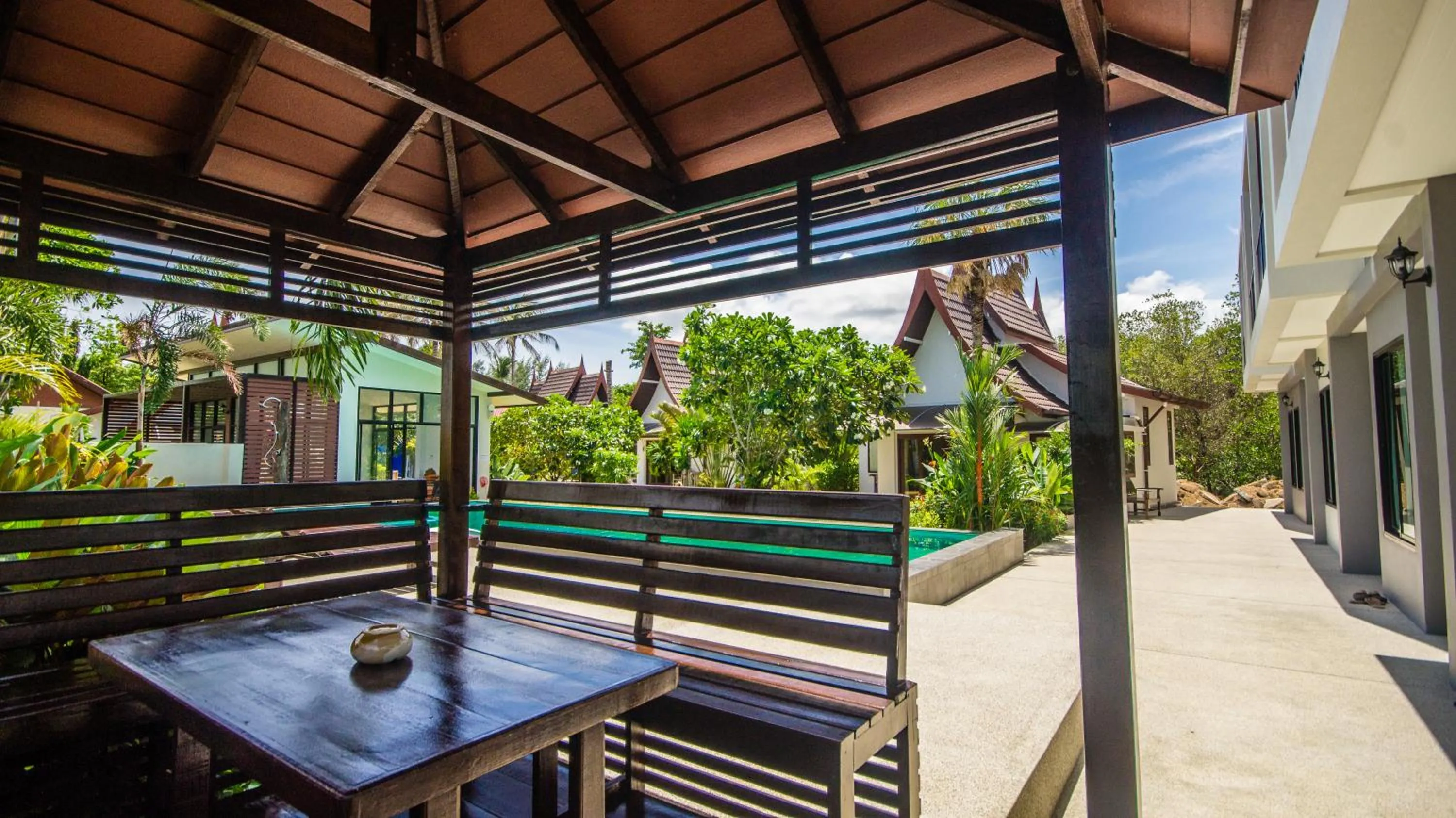 Communal lounge/ TV room in Nitchanan Villa