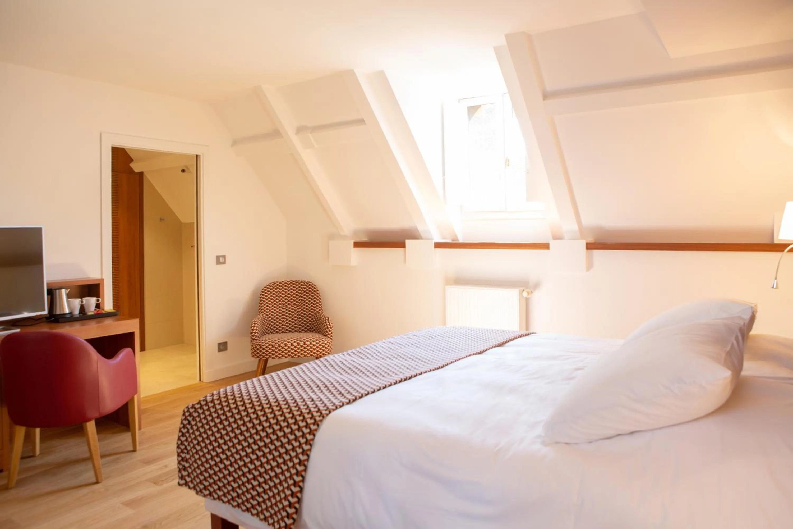 Bed in Hotel Le Clos De La Vouge