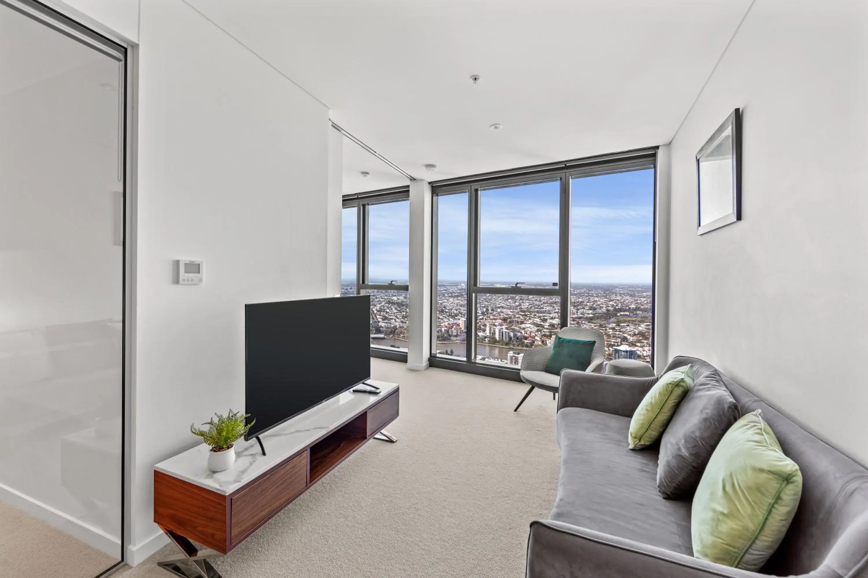 Two Bedroom One Bathroom Compact Sky High Apartment in Brisbane Skytower by CLLIX Two Bedroom One Bathroom Compact Sky High Apartment in Brisbane Skytower by CLLIX