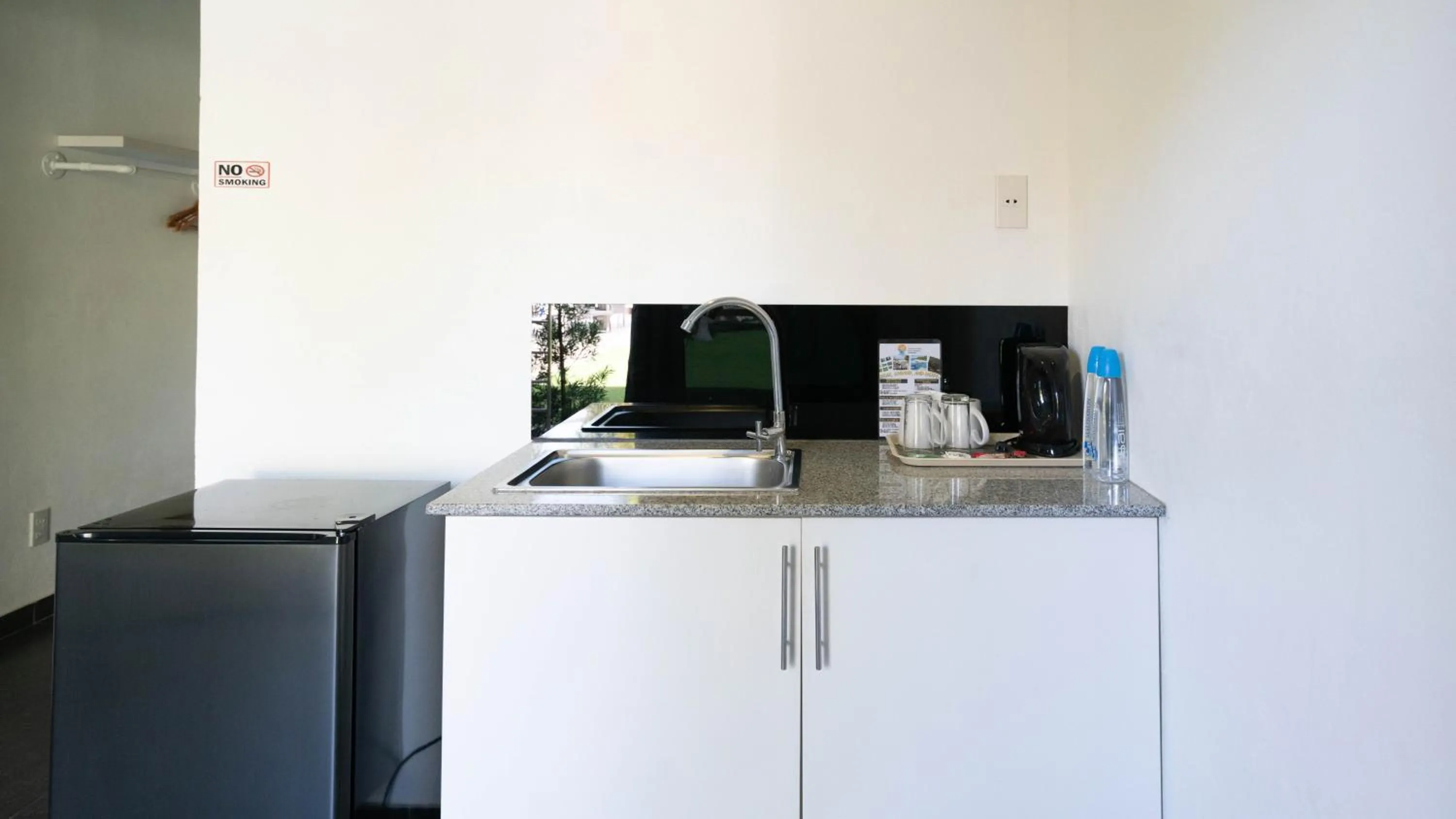 Kitchen or kitchenette in Malinawon Resort 馬莉吶灣度假中心