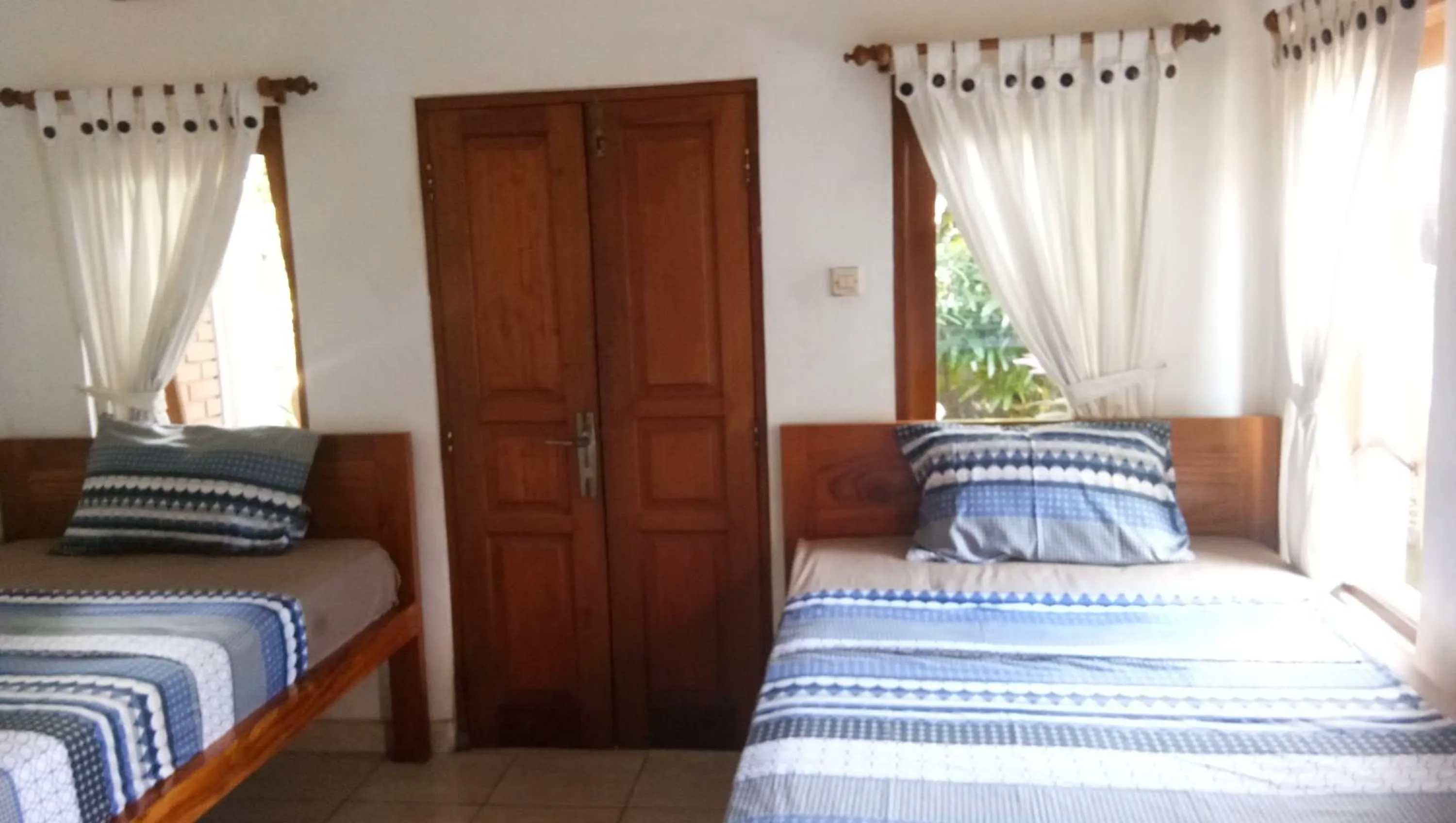 Bed in Medewi Beach Inn