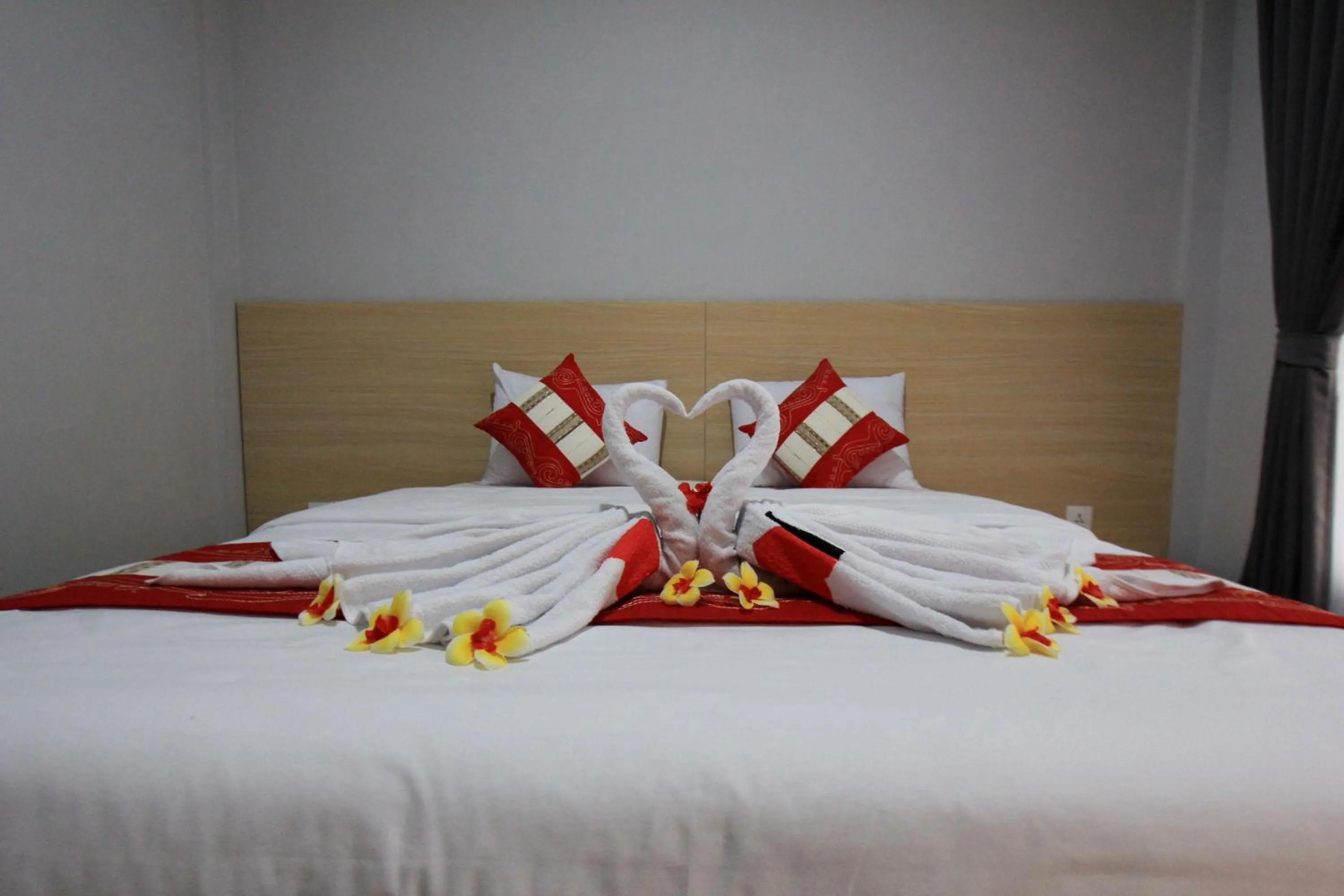 Bed in Tom Guest House