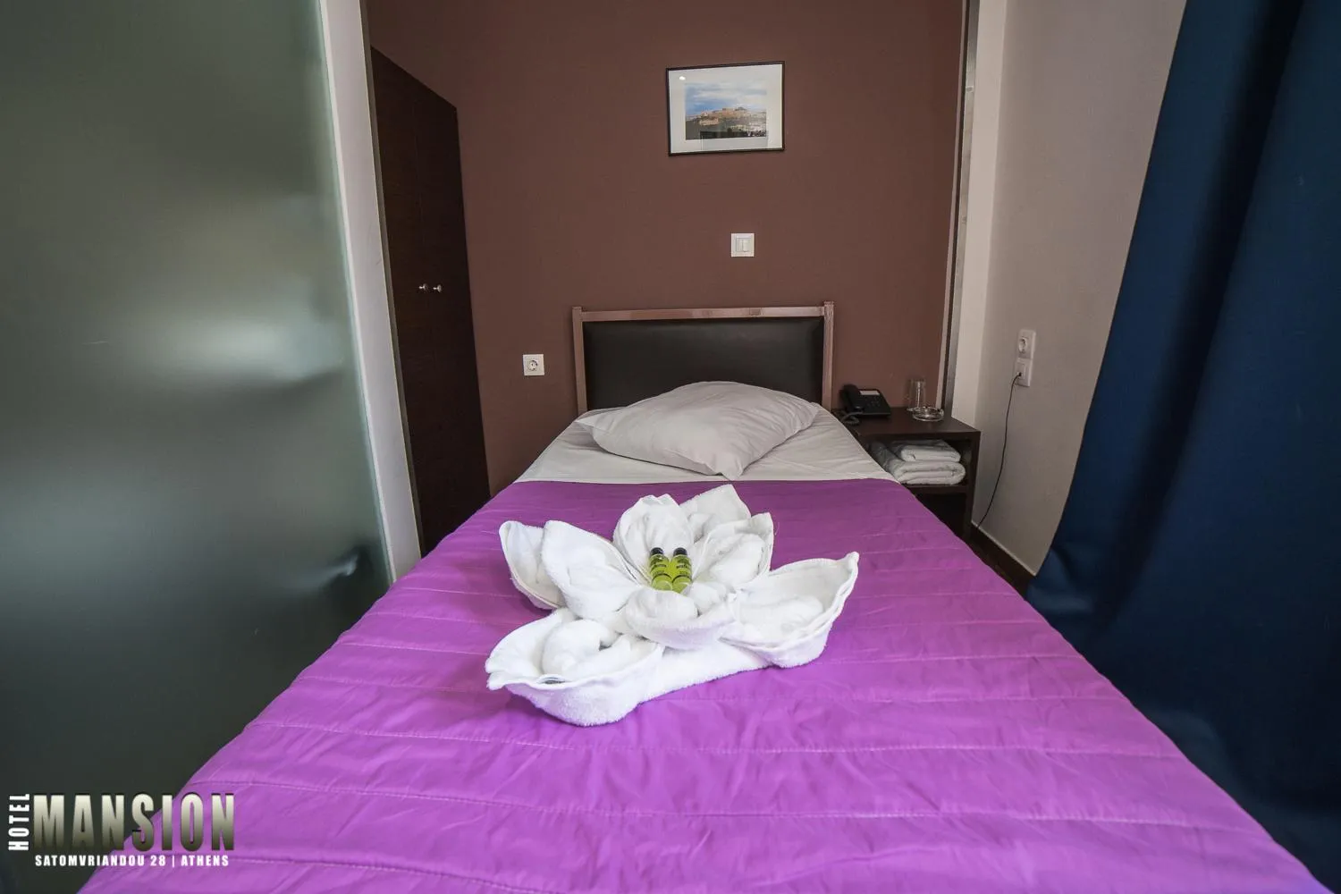 Bed in Mansion Hotel