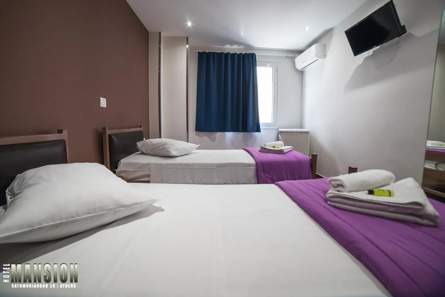 Bed in Mansion Hotel