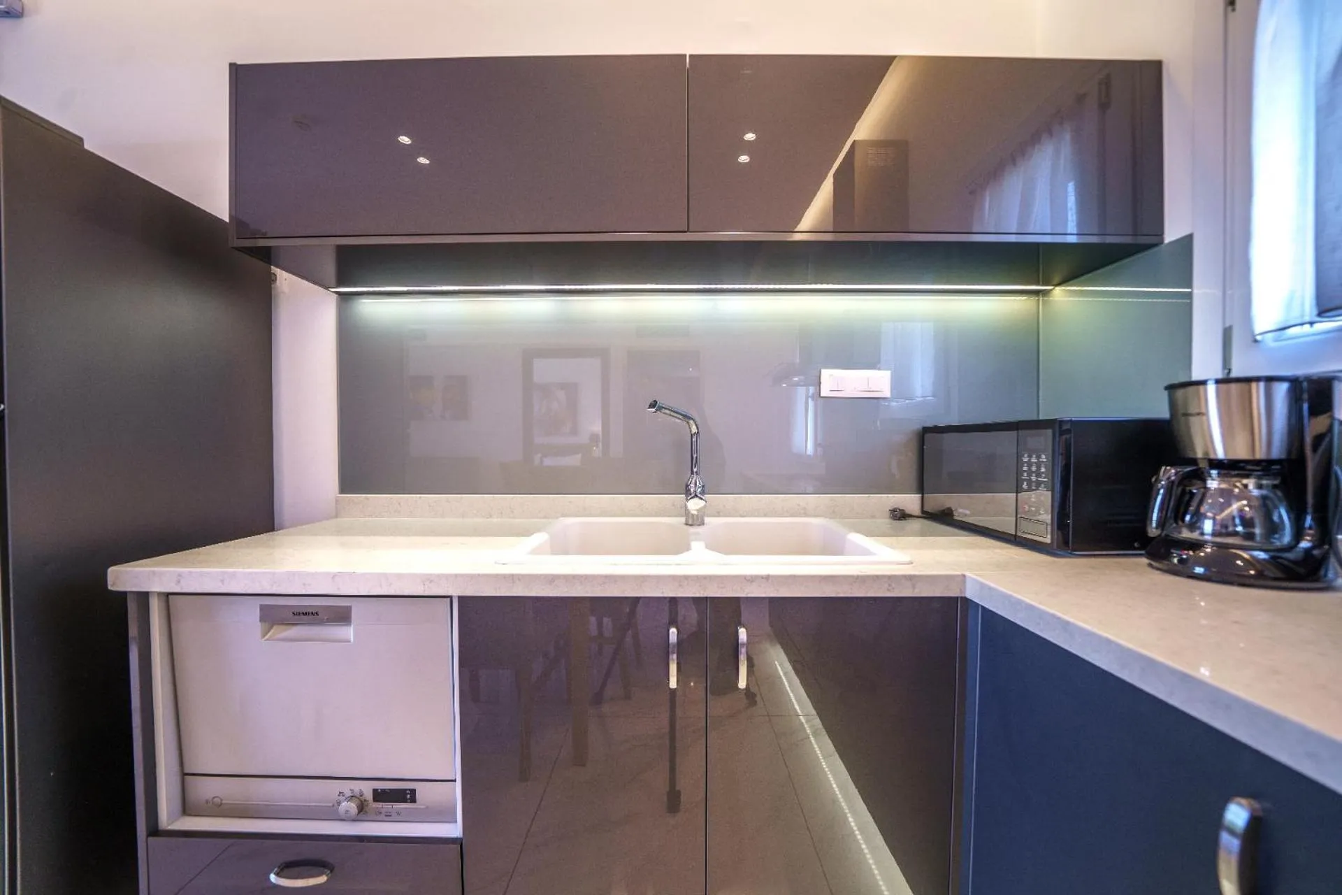Kitchen or kitchenette in Elysian Suites