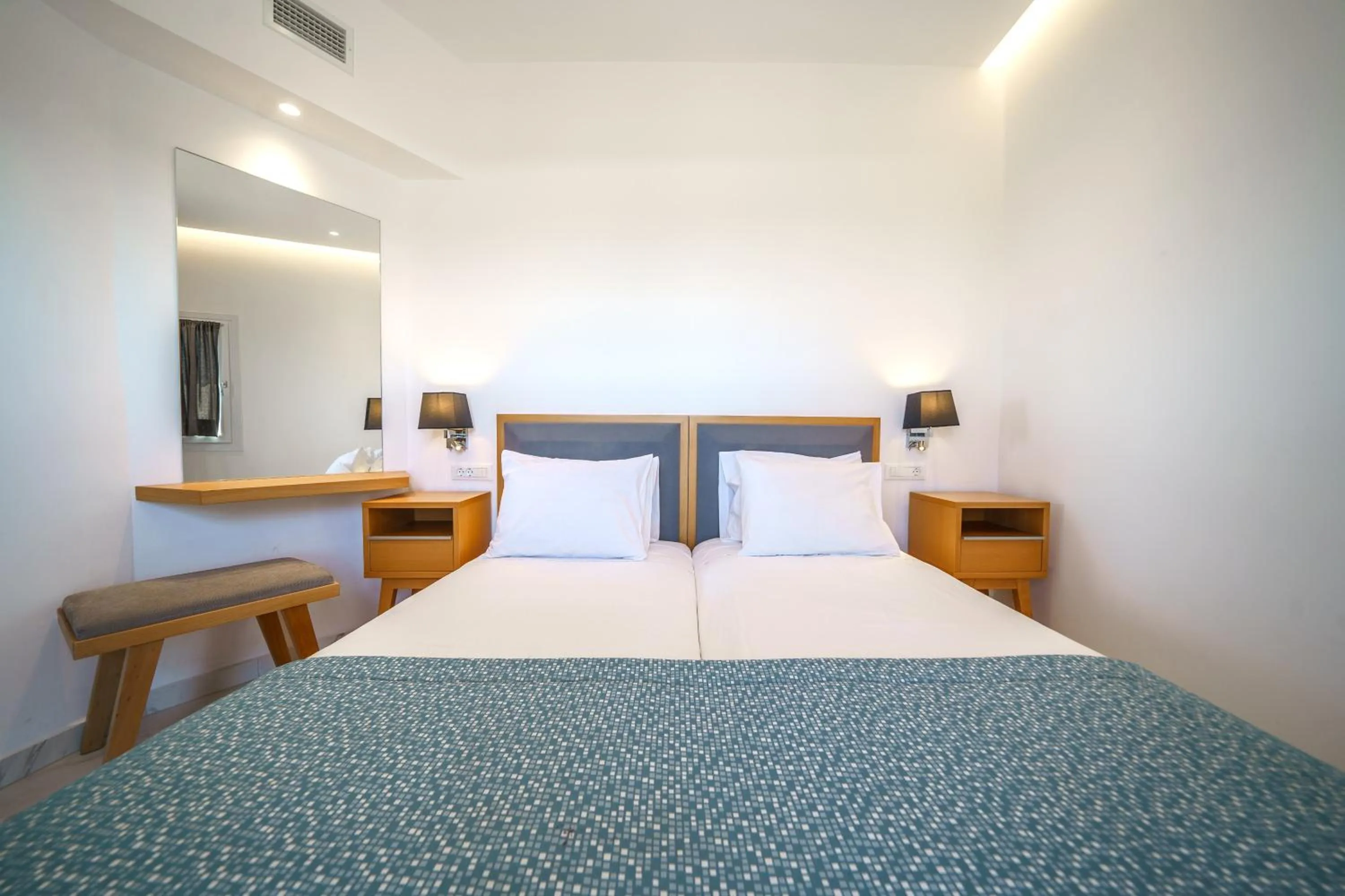 Bedroom, Bed in Elysian Suites