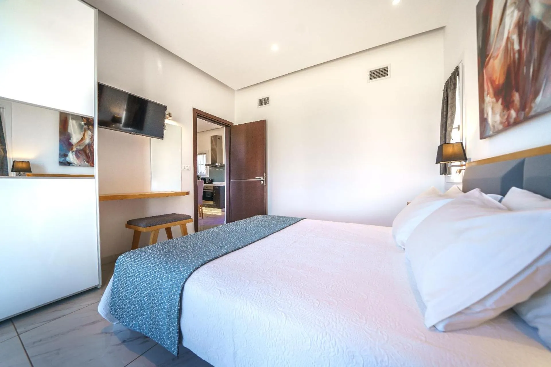 Bedroom, Bed in Elysian Suites