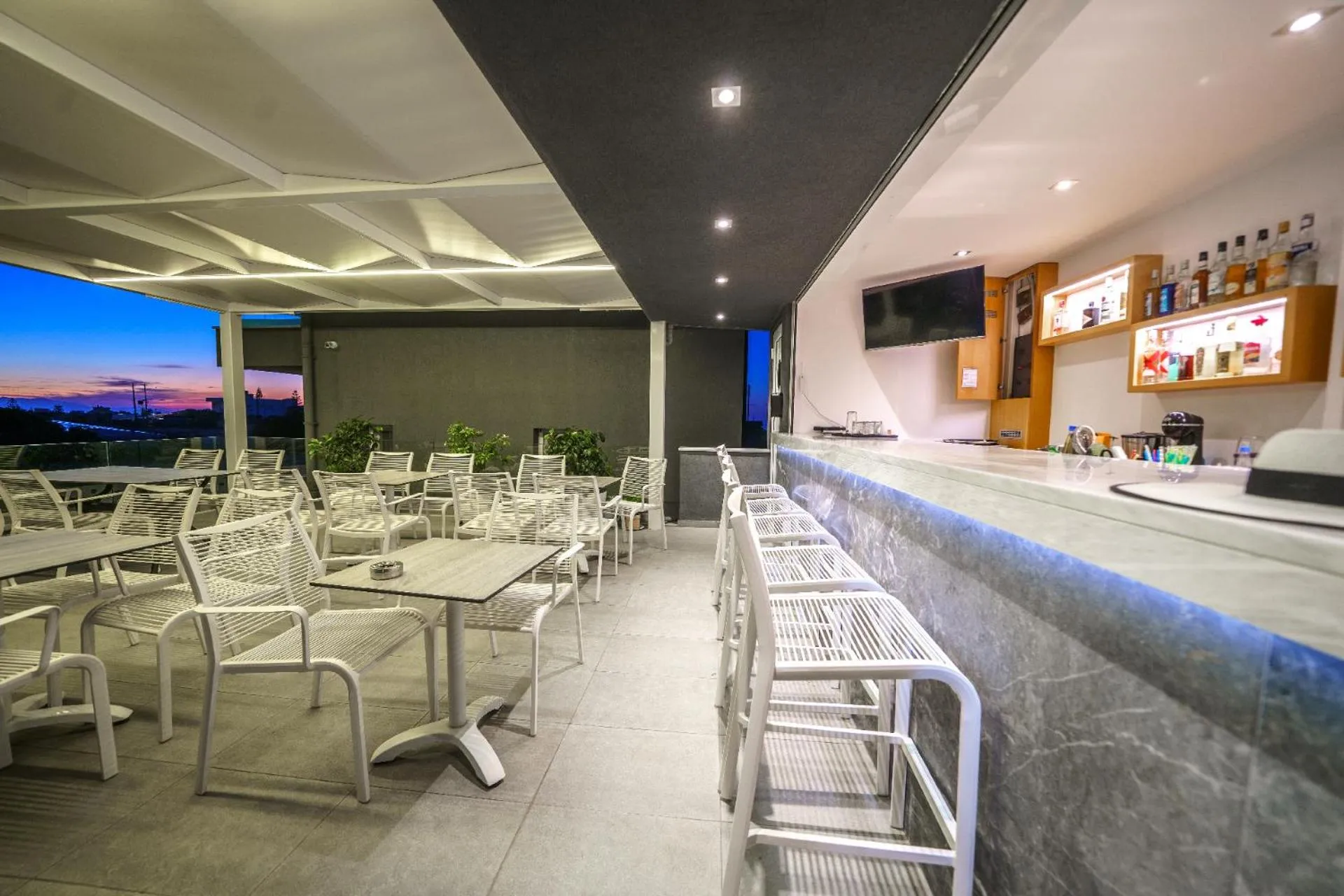 Lounge or bar in Elysian Suites