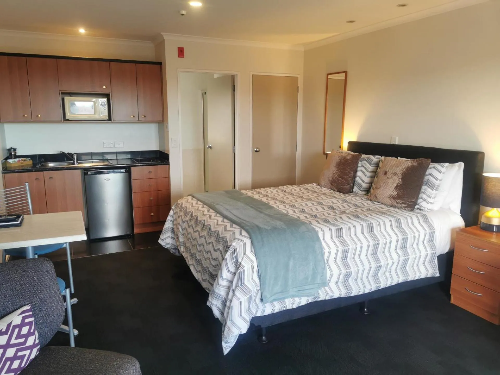 Bed in ASURE Ascot Motor Inn