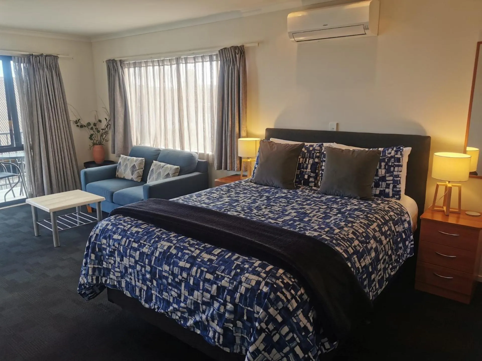 Bed in ASURE Ascot Motor Inn