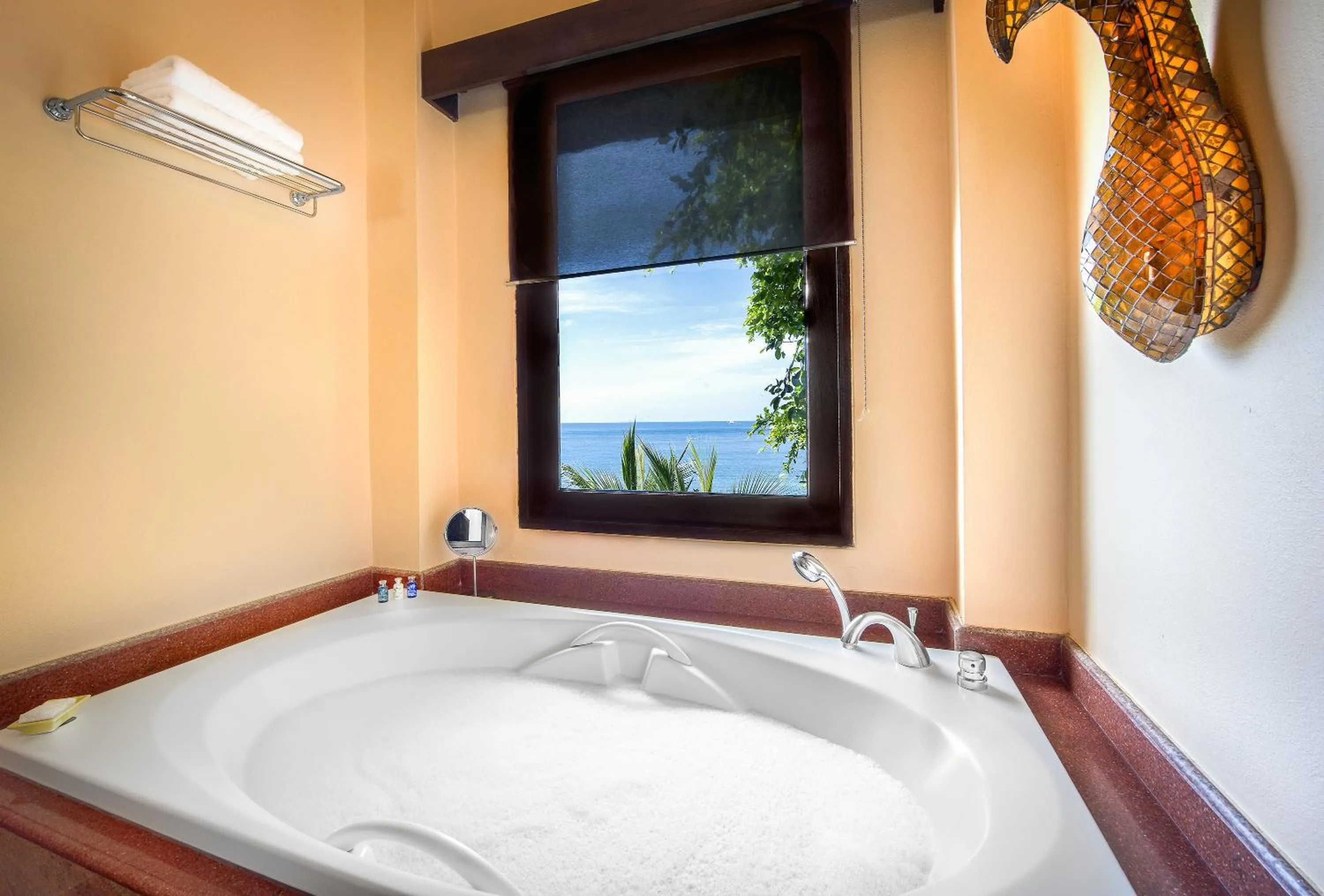 Bathroom, Bed in Jamahkiri Dive Resort & Spa