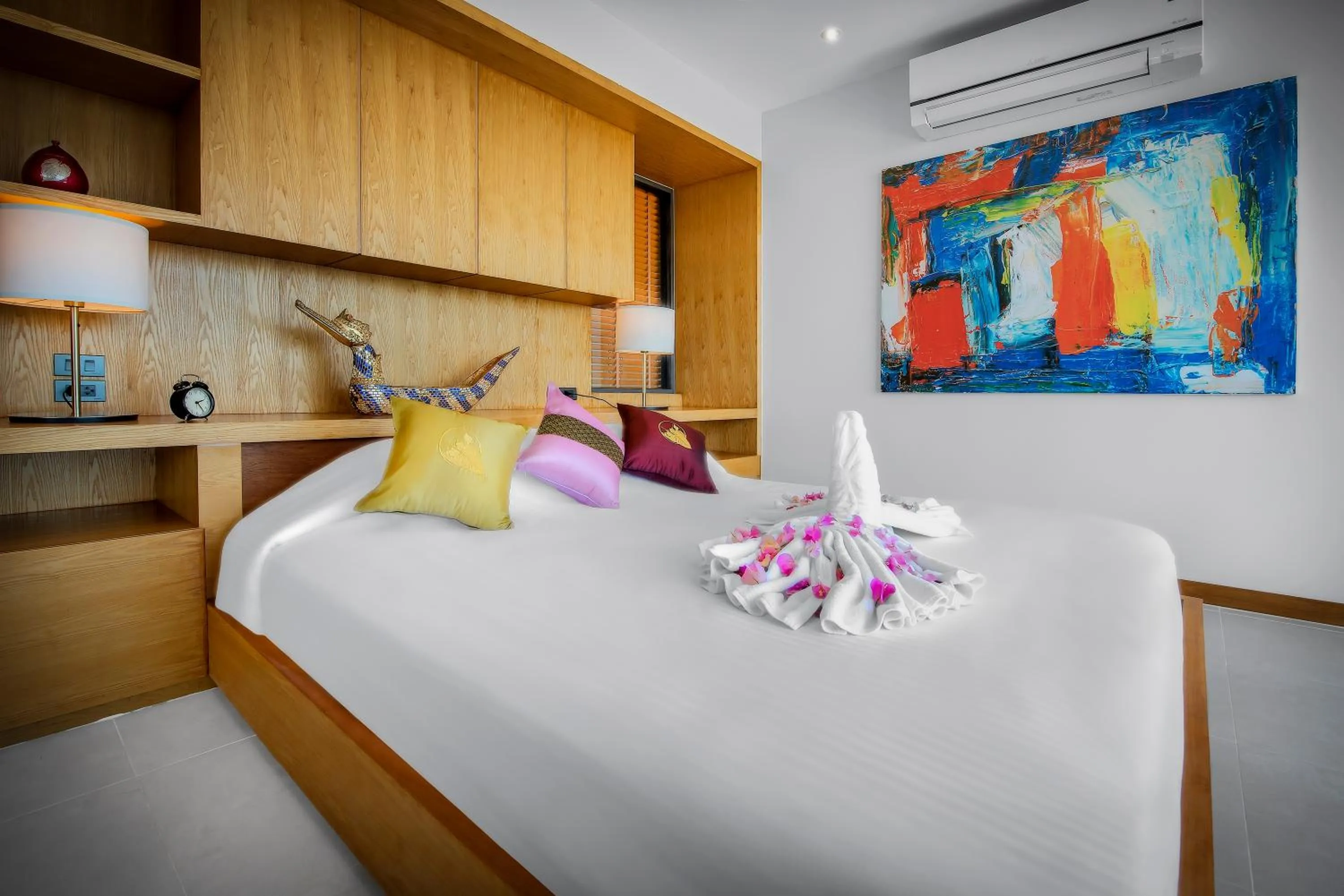 Bed in Jamahkiri Dive Resort & Spa