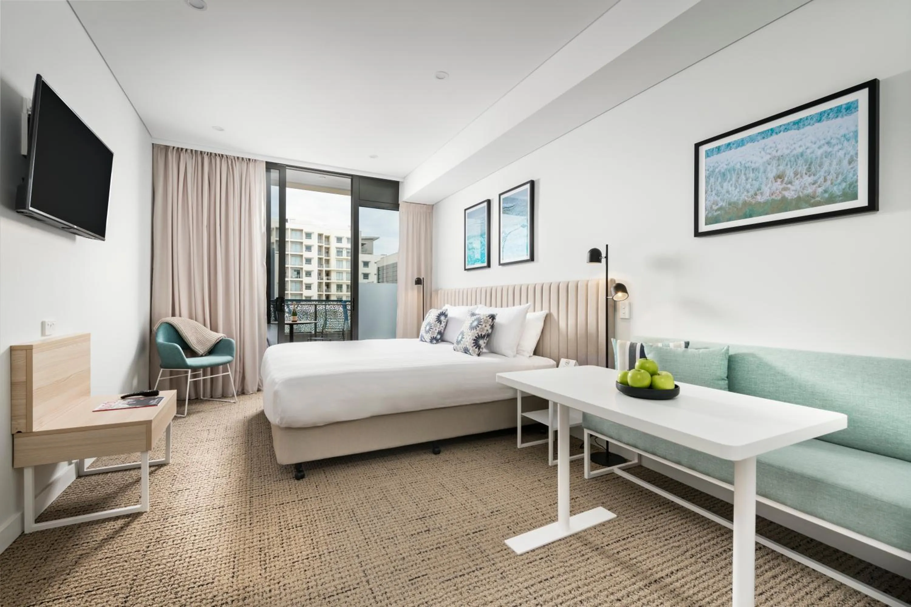 Seating area, Bed in Quest Scarborough