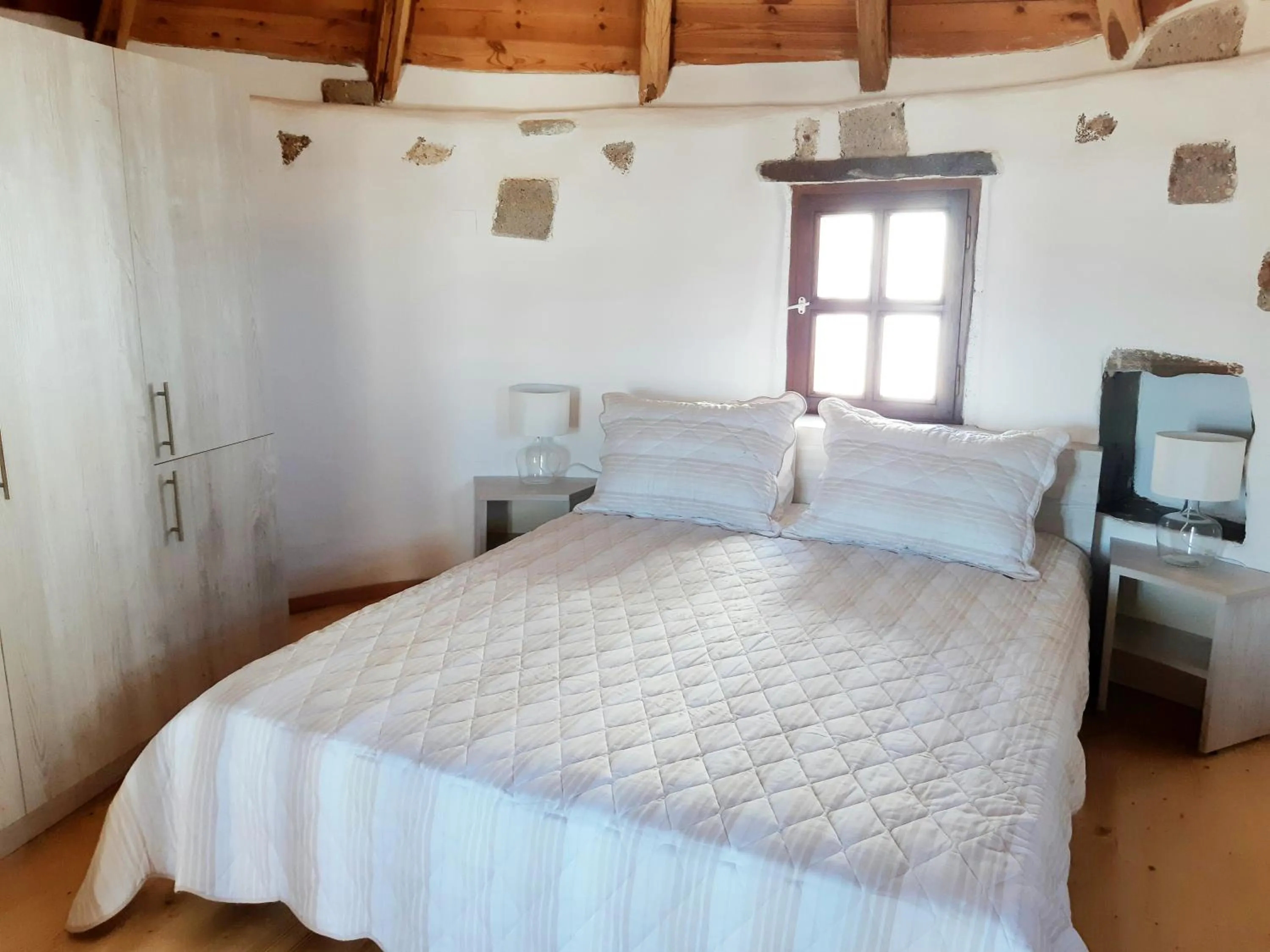 Bed in Fotilia Hotel