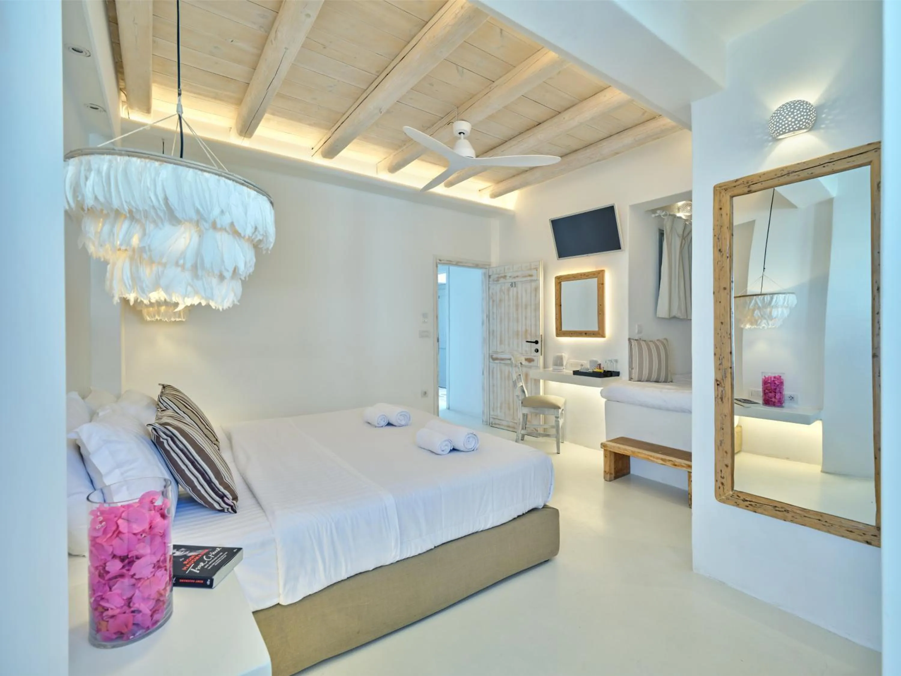 Bed in Zefi Hotel & Suites