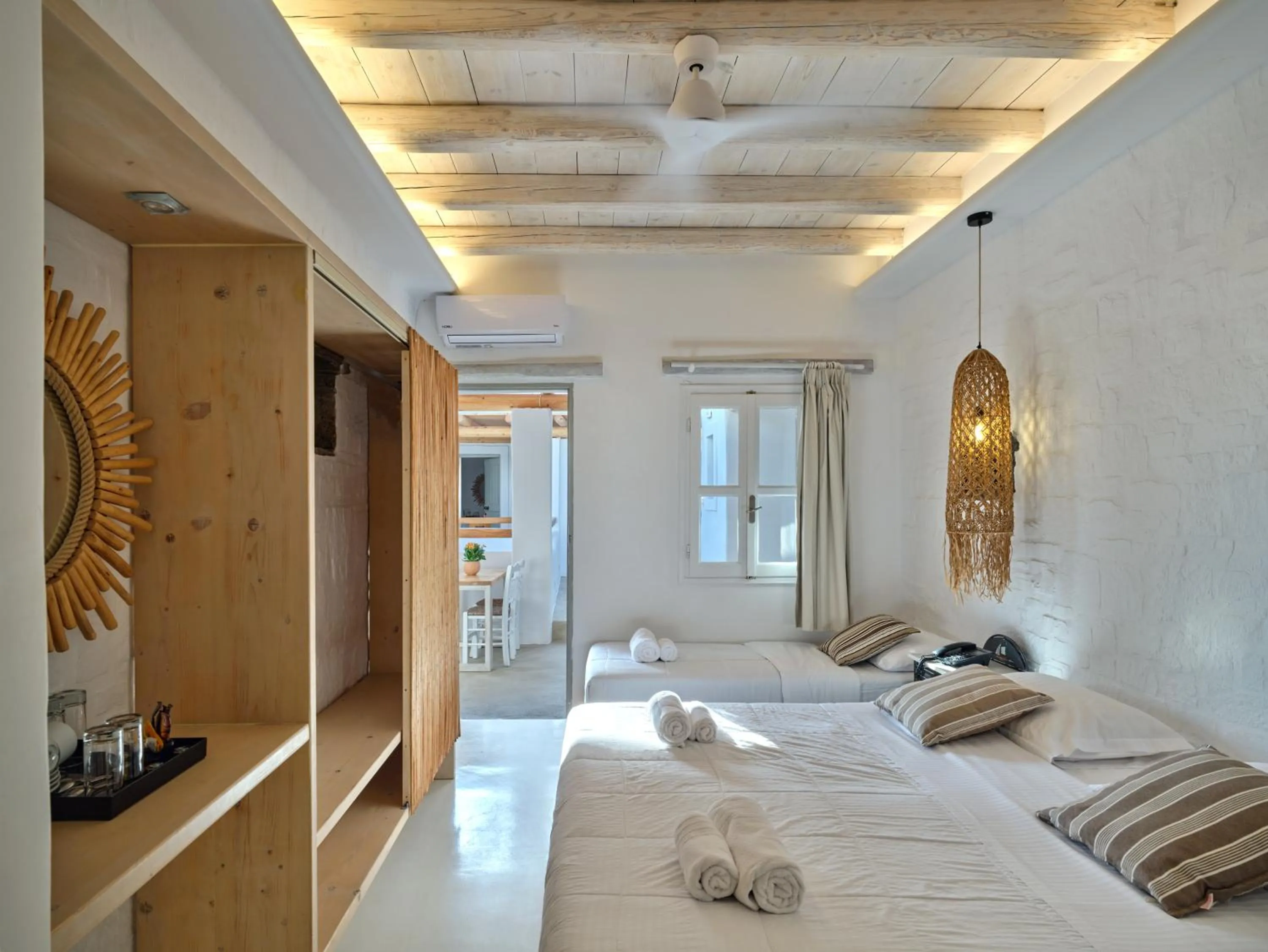 Bed in Zefi Hotel & Suites