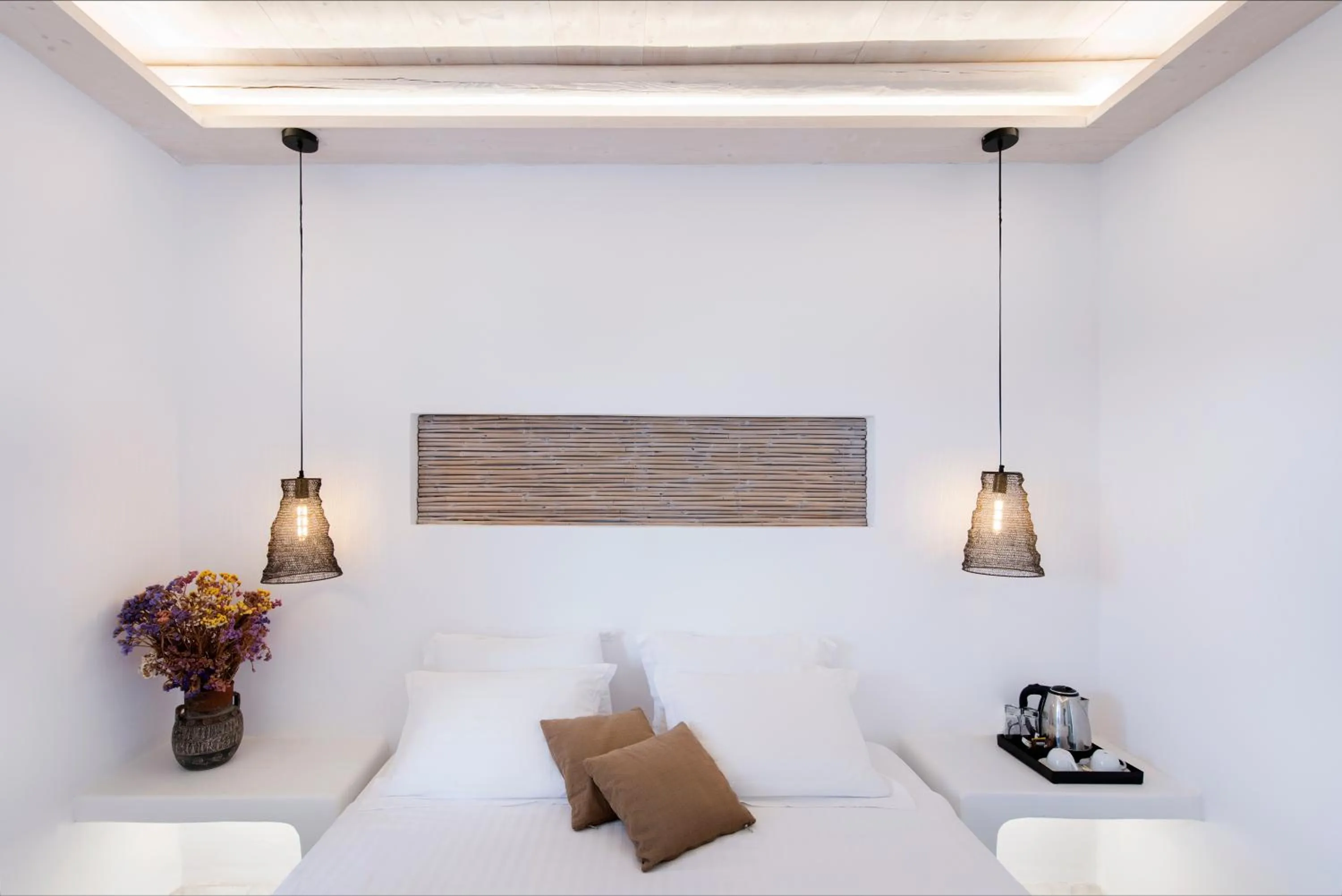 Bed in Zefi Hotel & Suites