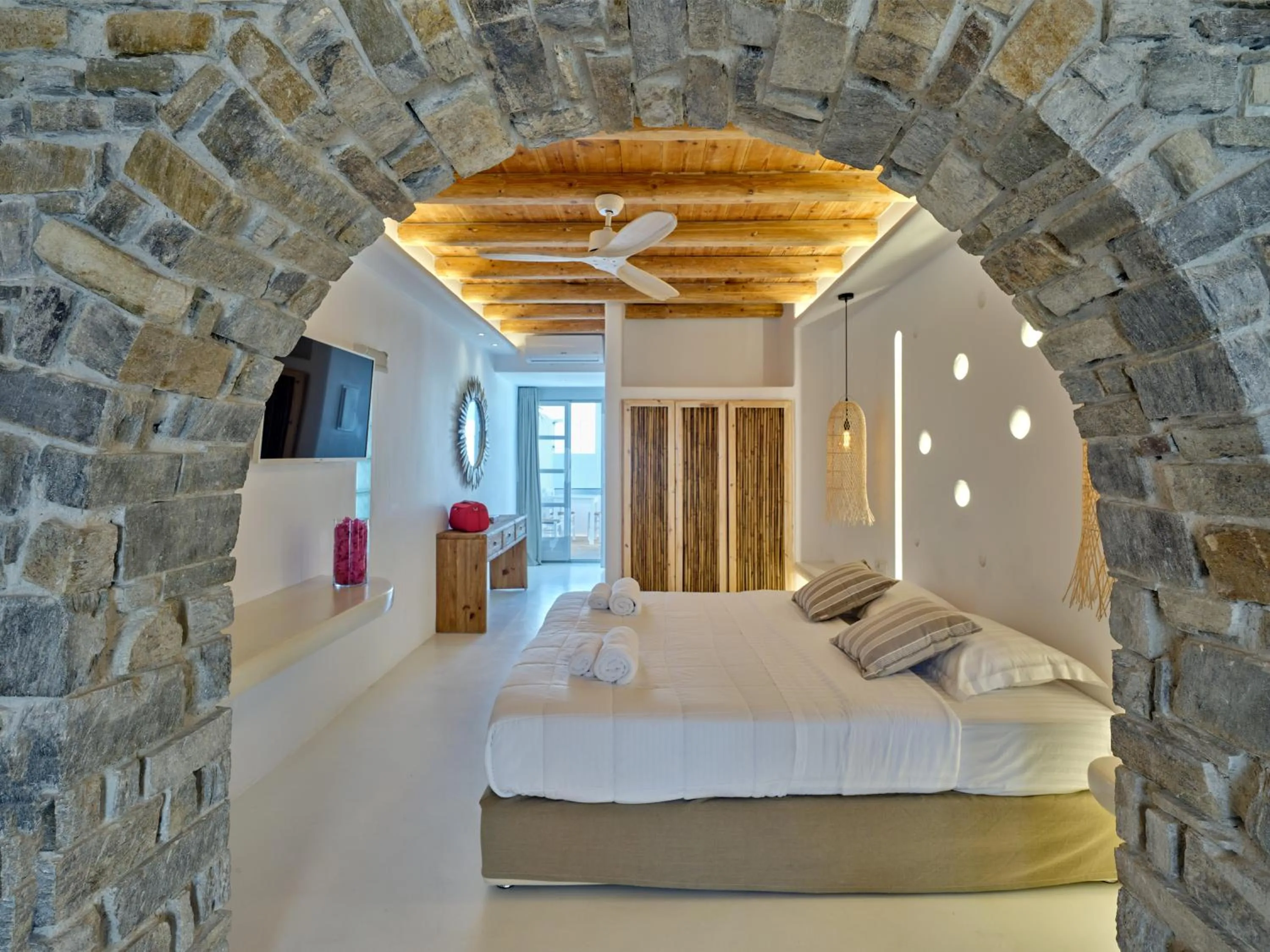 Bed in Zefi Hotel & Suites