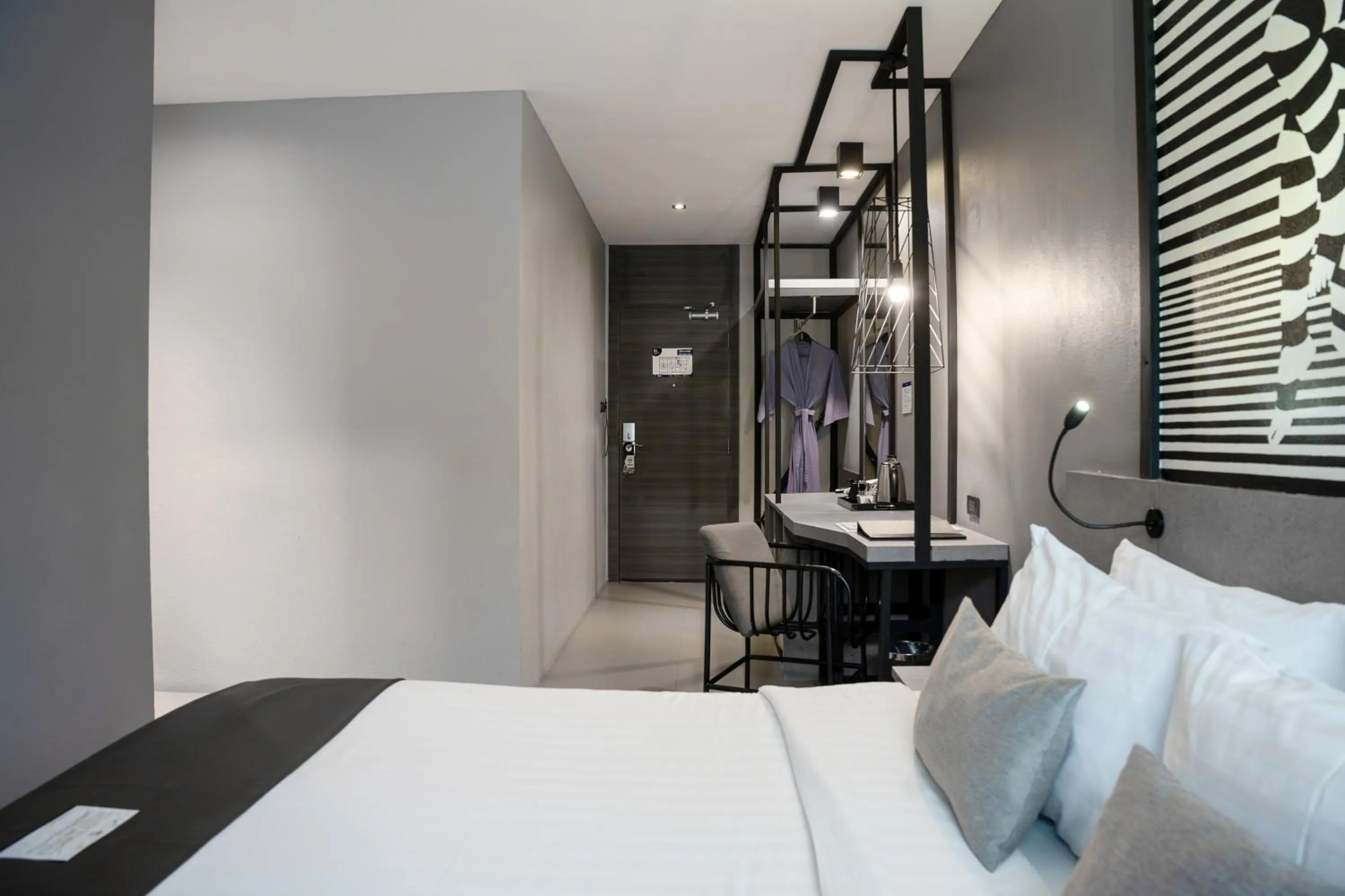 Bed in Mazi Design Hotel by Kalima