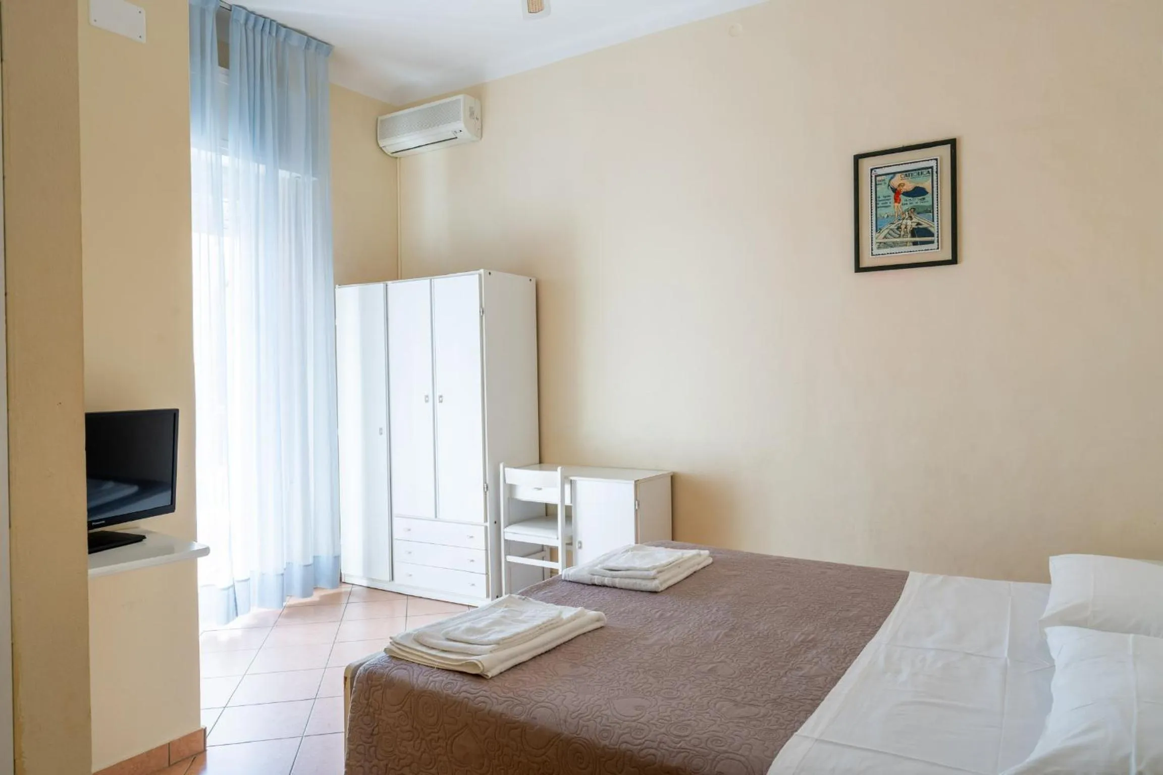 Bed in Hotel Miramare