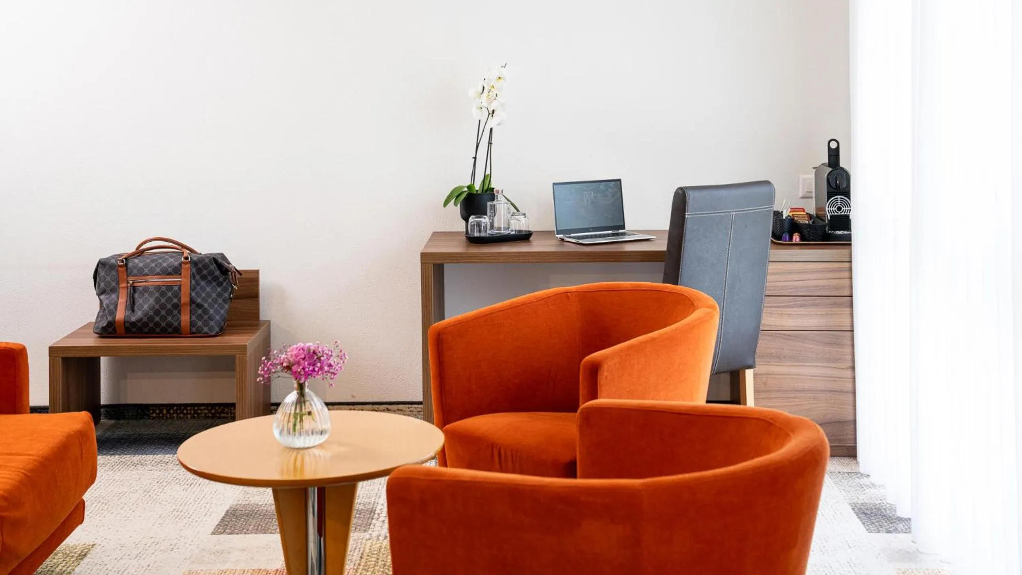 Seating area in Swiss Heidi Hotel