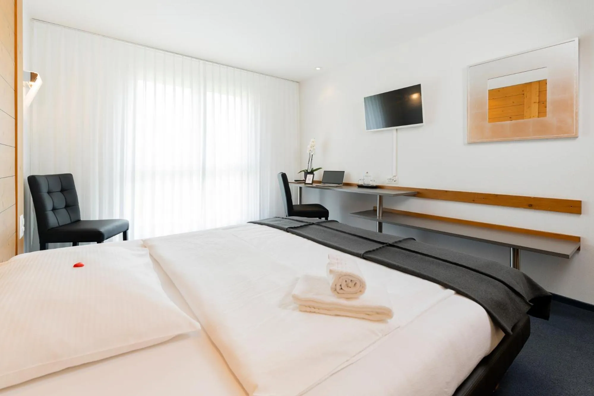 Bed in Swiss Heidi Hotel