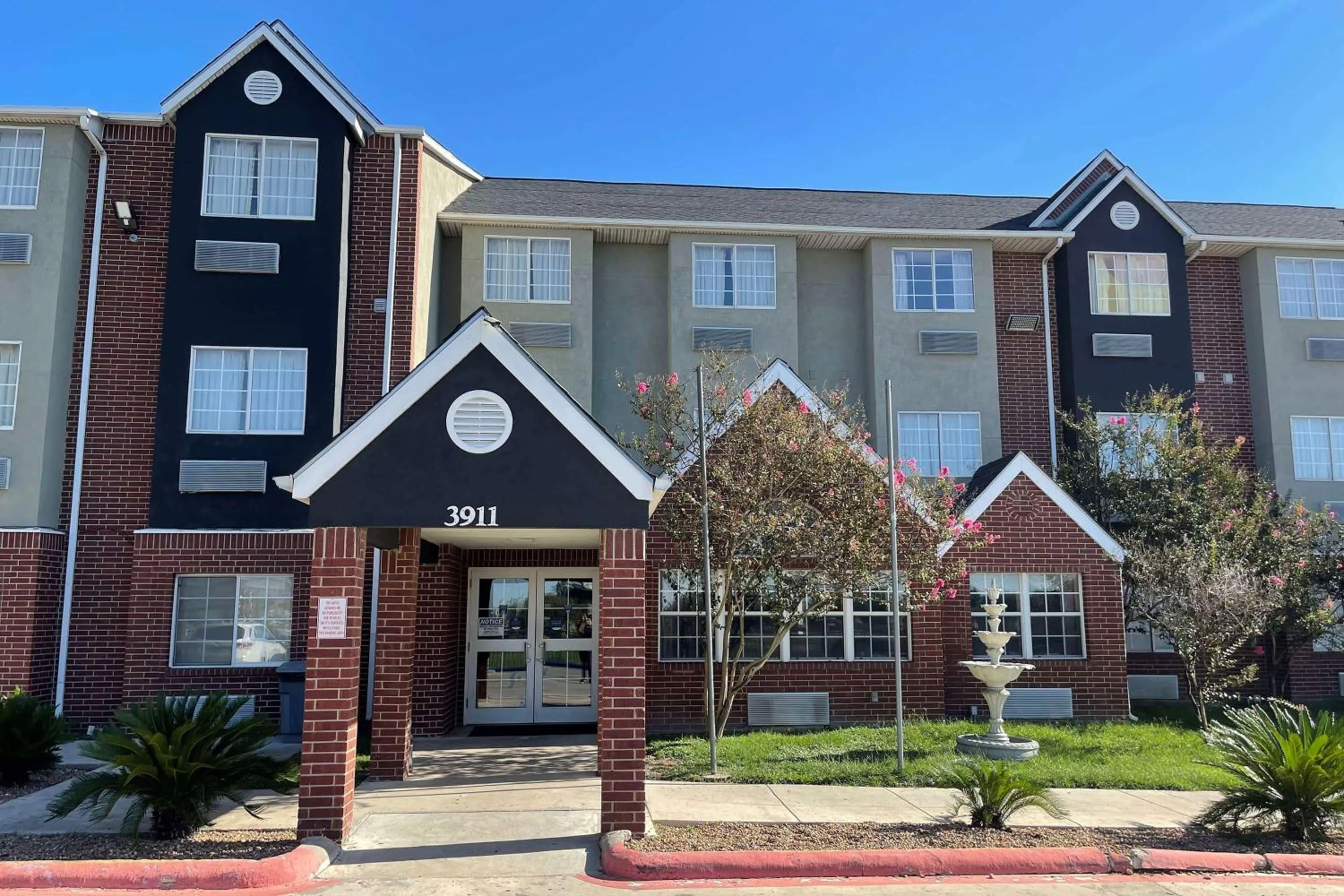 Property building in Super 8 by Wyndham San Antonio Downtown NE