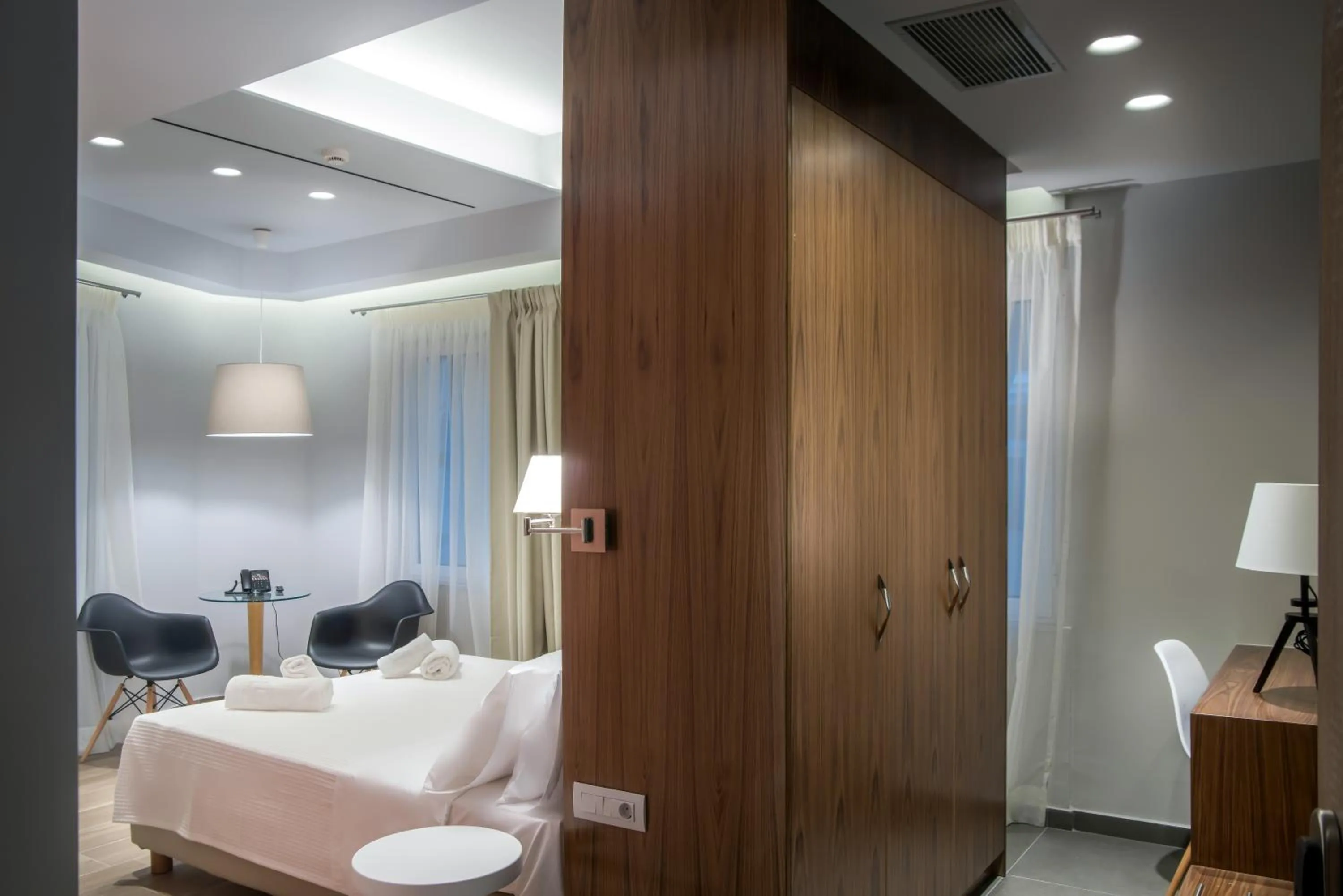 Bed in AD Athens Luxury Rooms & Suites