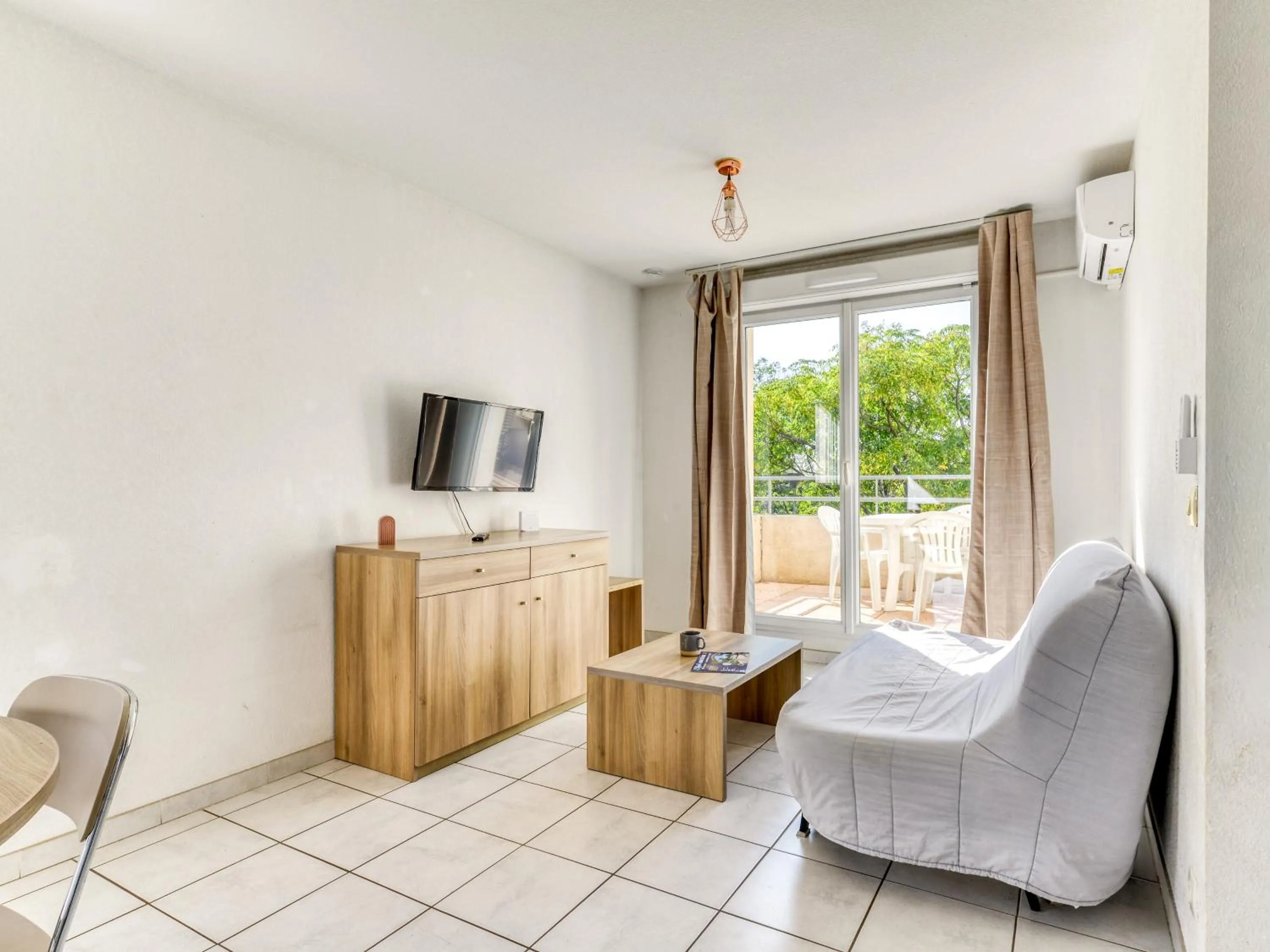 Living room in Vacancéole - Résidence Cap Camargue