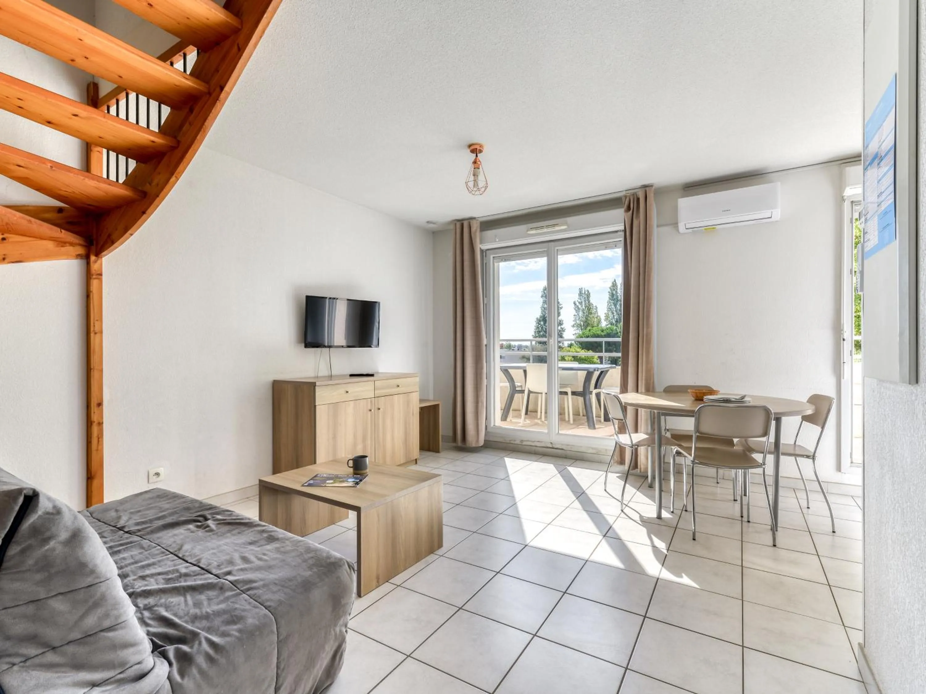 Living room in Vacancéole - Résidence Cap Camargue