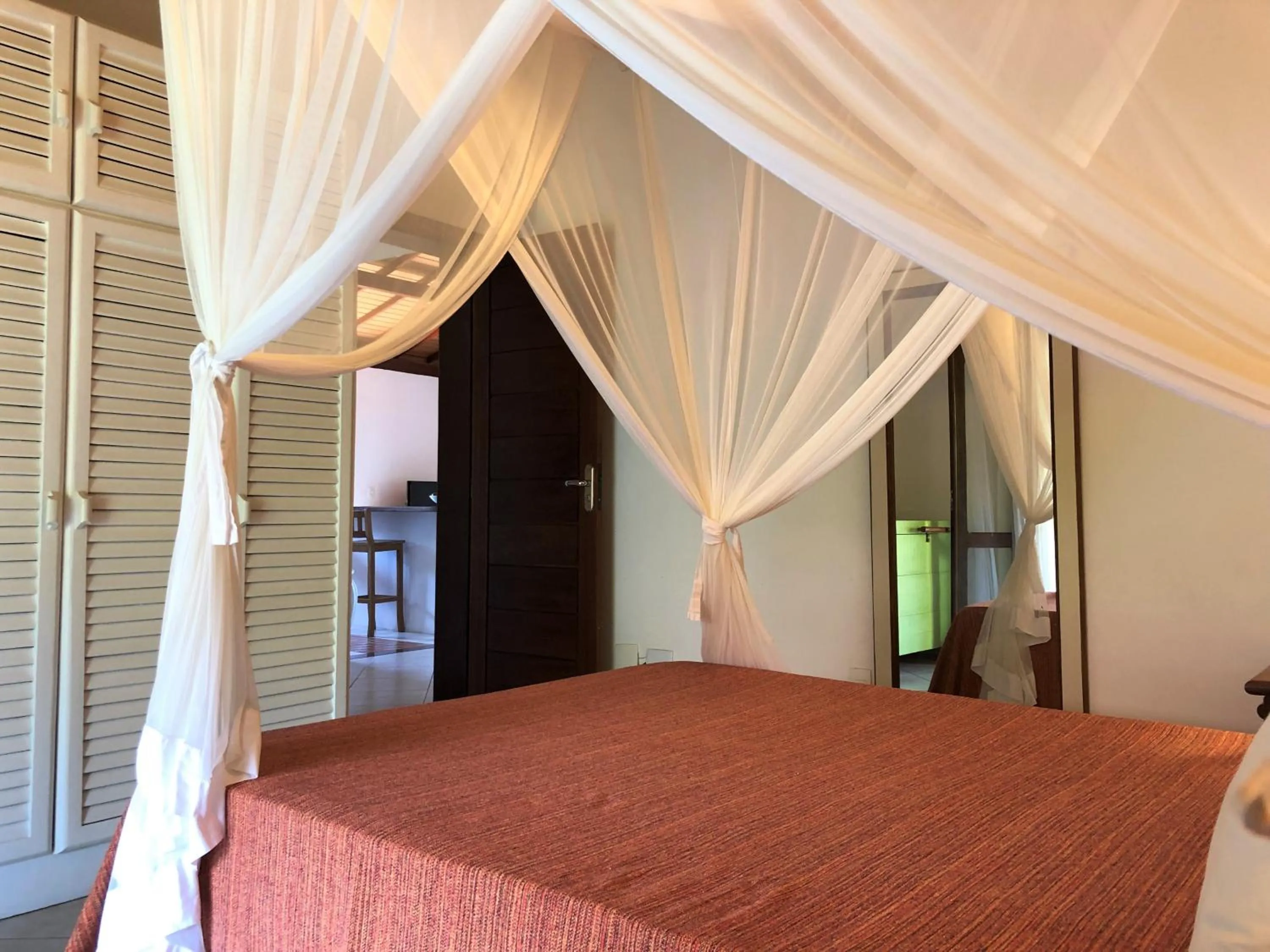 Bed in Ouro Sobre Azul Apart Hotel