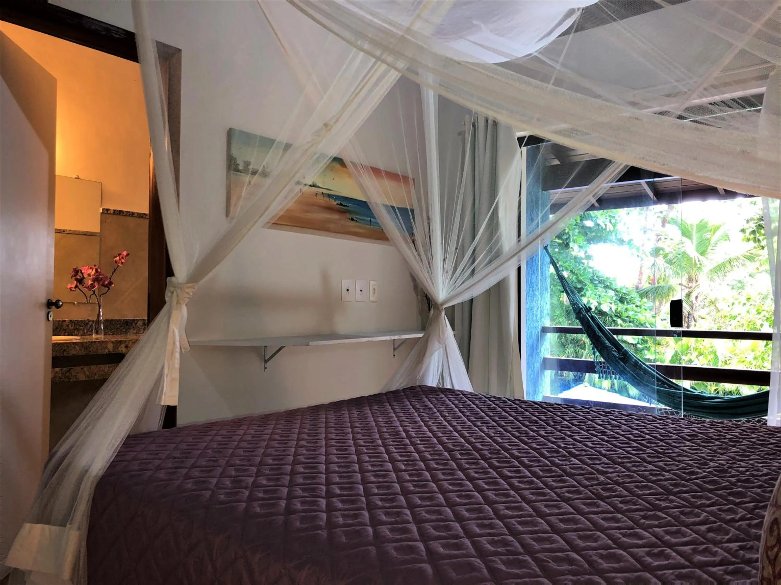 Bed in Ouro Sobre Azul Apart Hotel