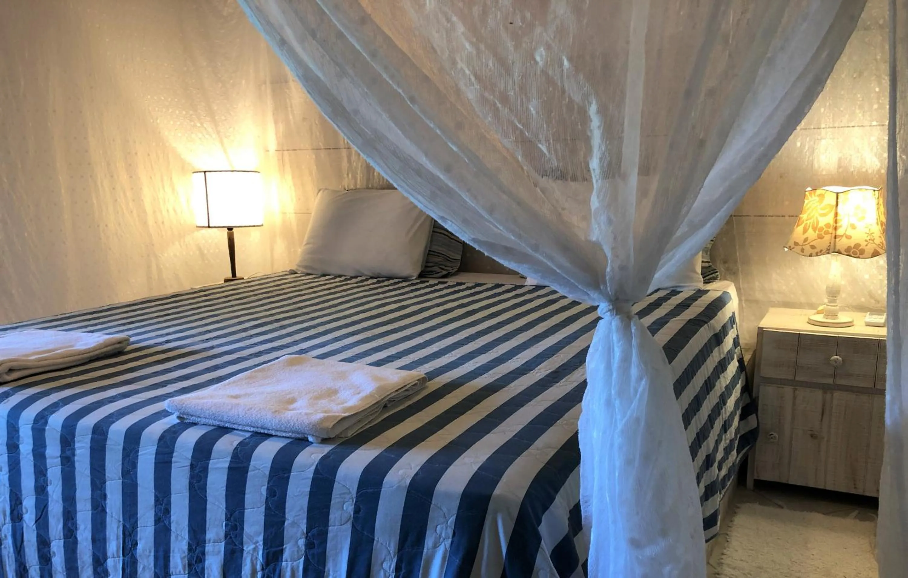 Bed in Ouro Sobre Azul Apart Hotel