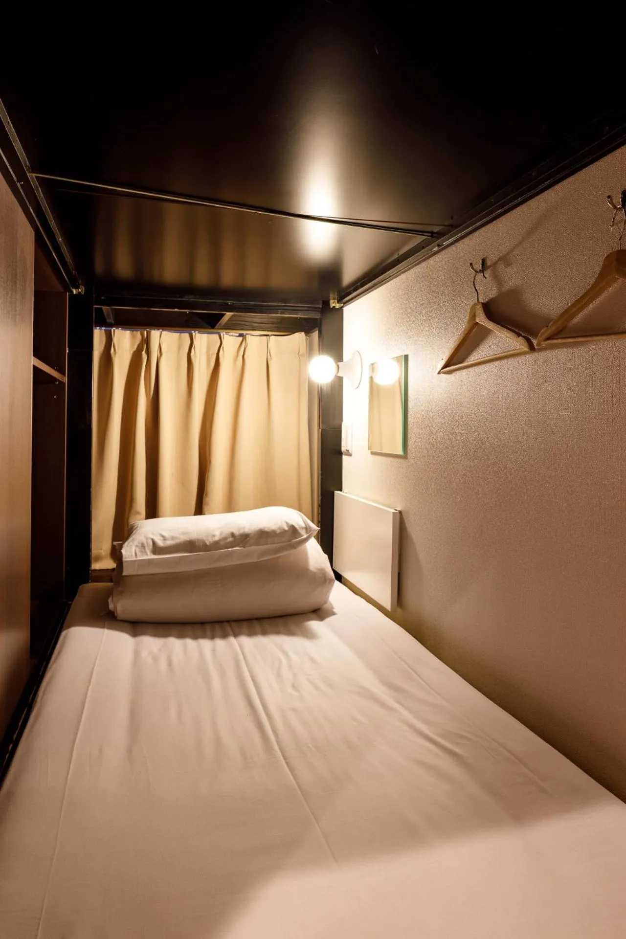 Bed in Hotel Owl Tokyo Nippori