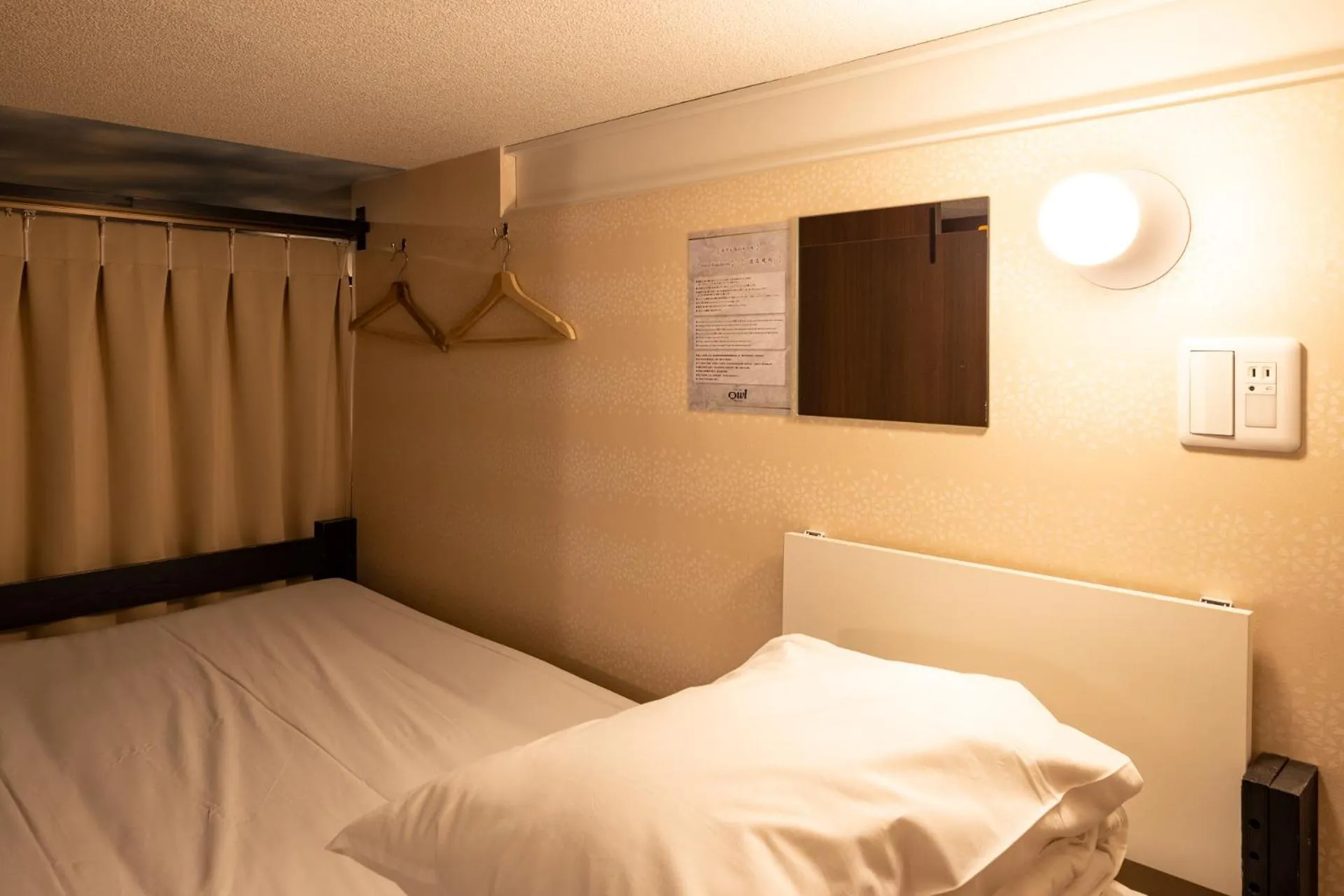 Bed in Hotel Owl Tokyo Nippori