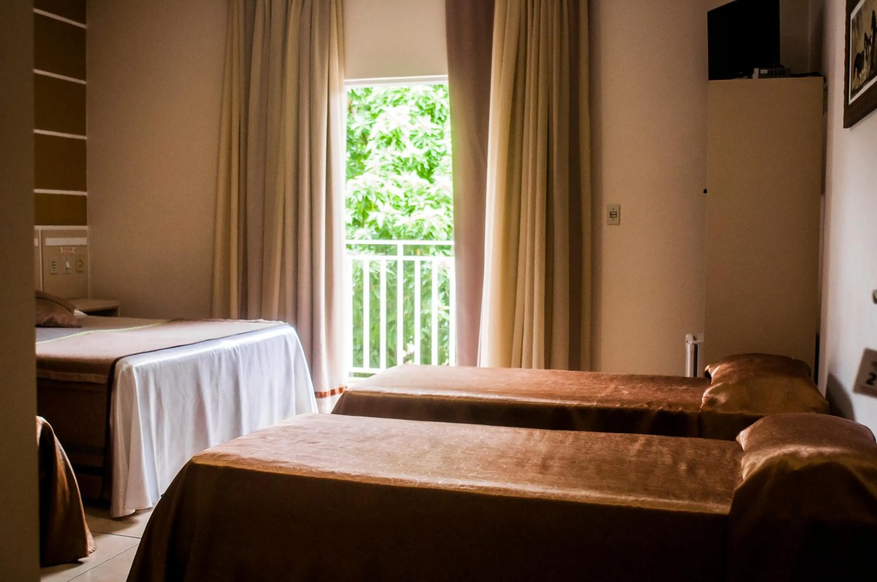 Bed in Pousada Cataratas