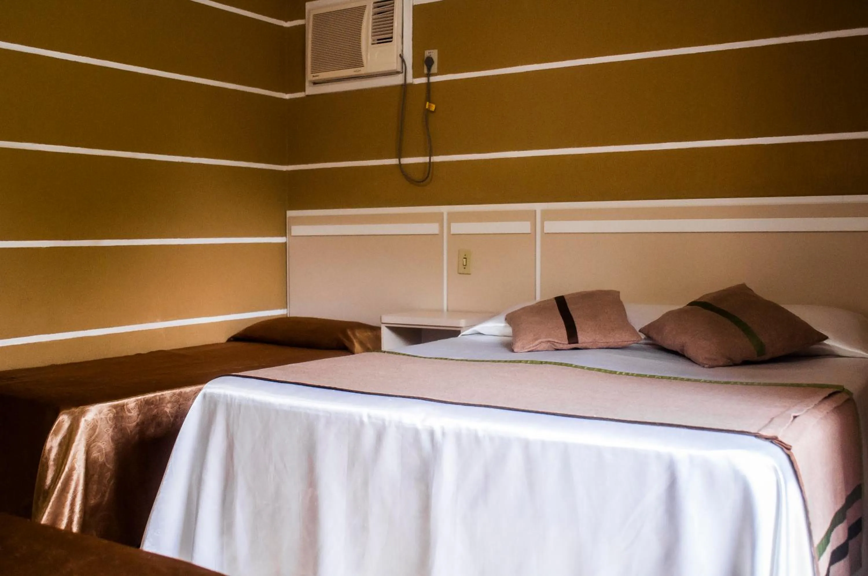 Bed in Pousada Cataratas