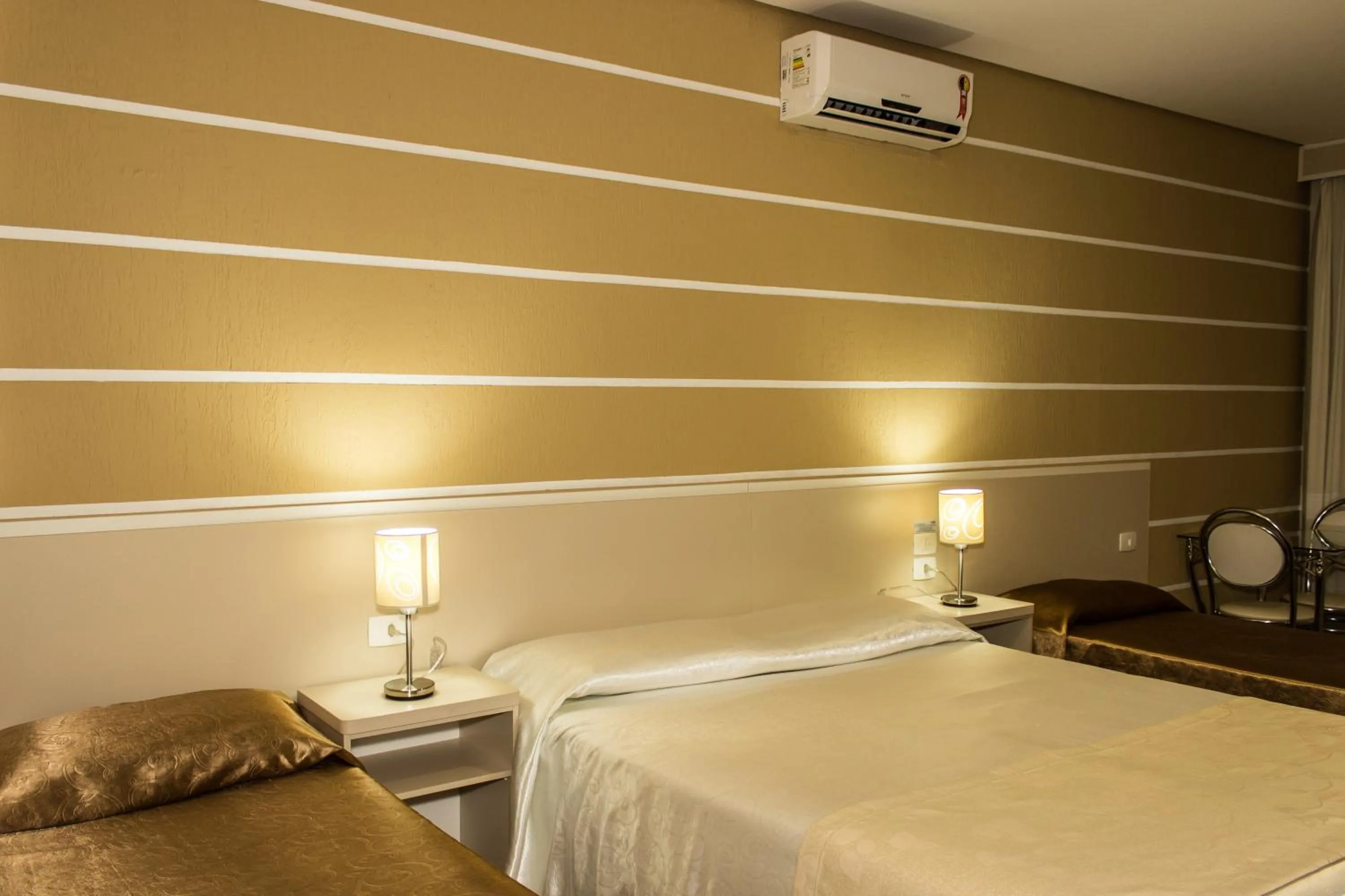 Bed in Pousada Cataratas