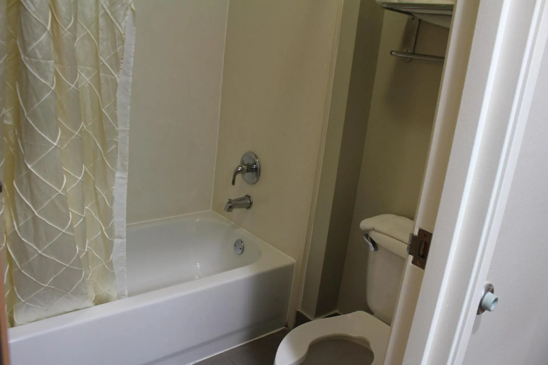 Bathroom in Home Gate Inn & Suites