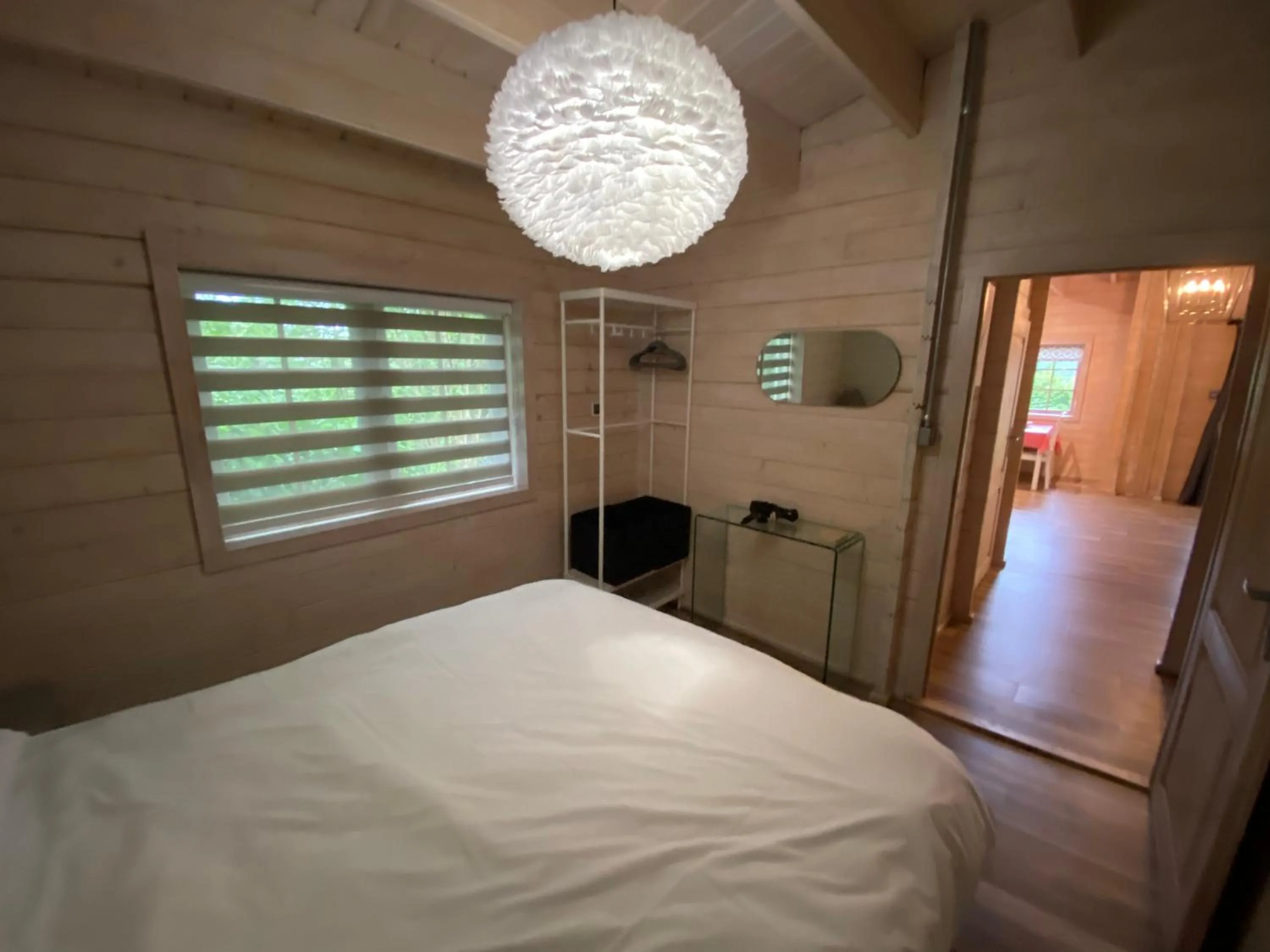 Bedroom in The Secret Cottage & Hideaway Caravan