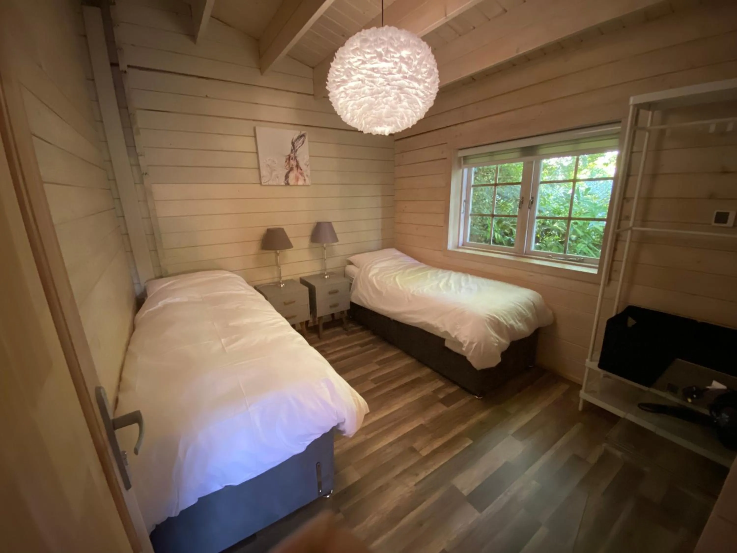 Bedroom in The Secret Cottage & Hideaway Caravan