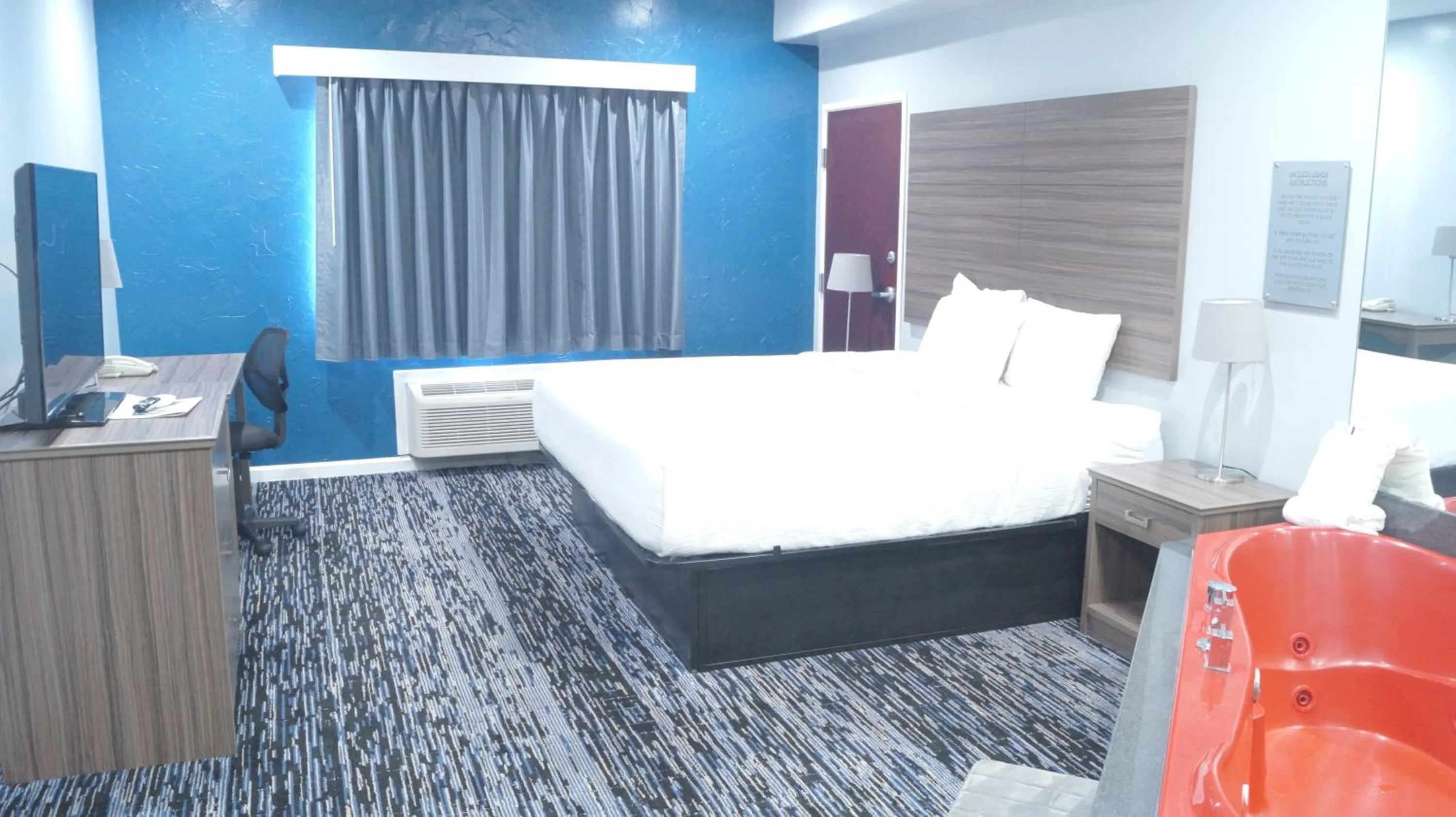 Bed in Magnolia Inn and Suites Olive Branch