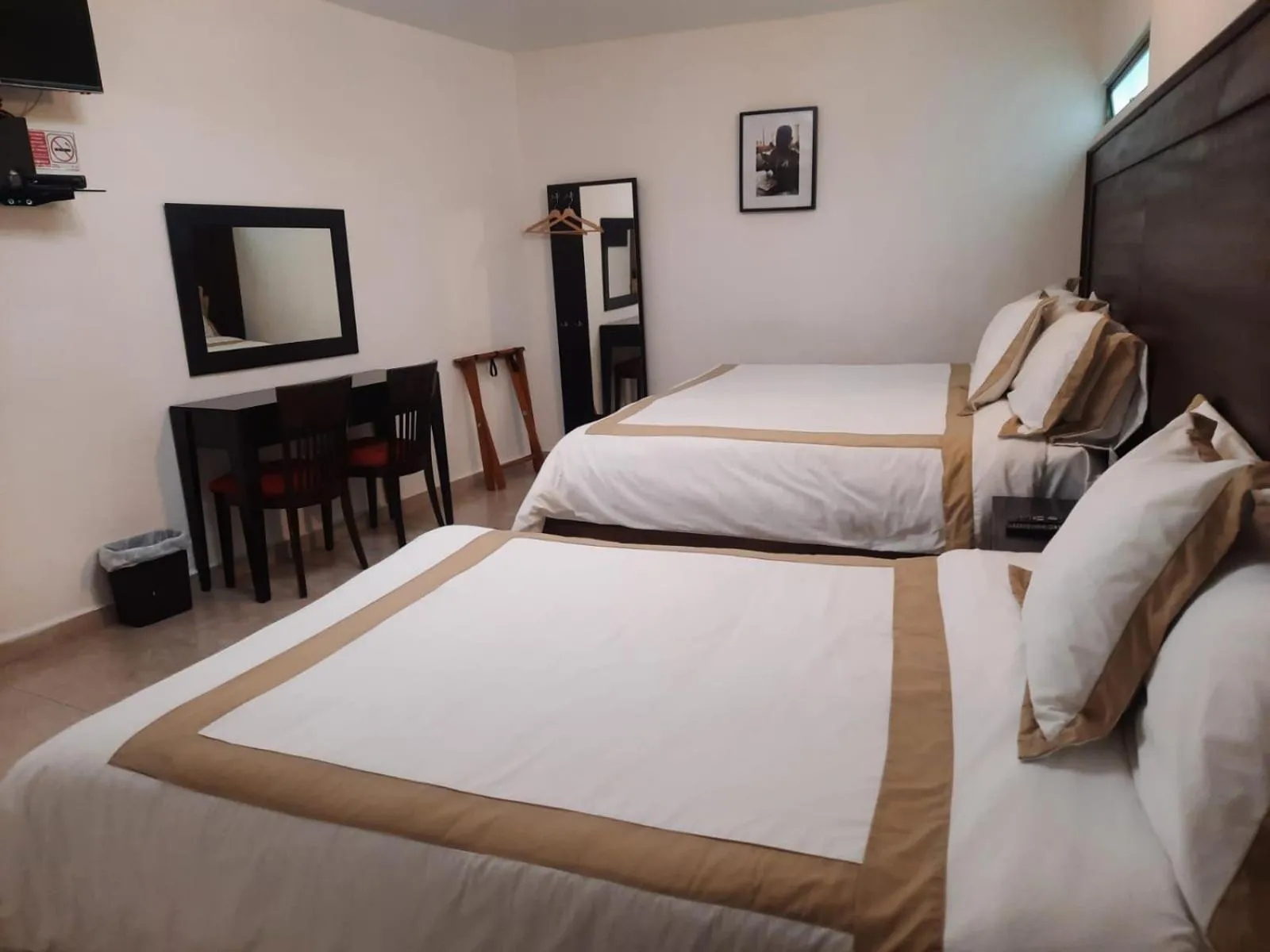 Bed in Hotel Boutique Yaocalli