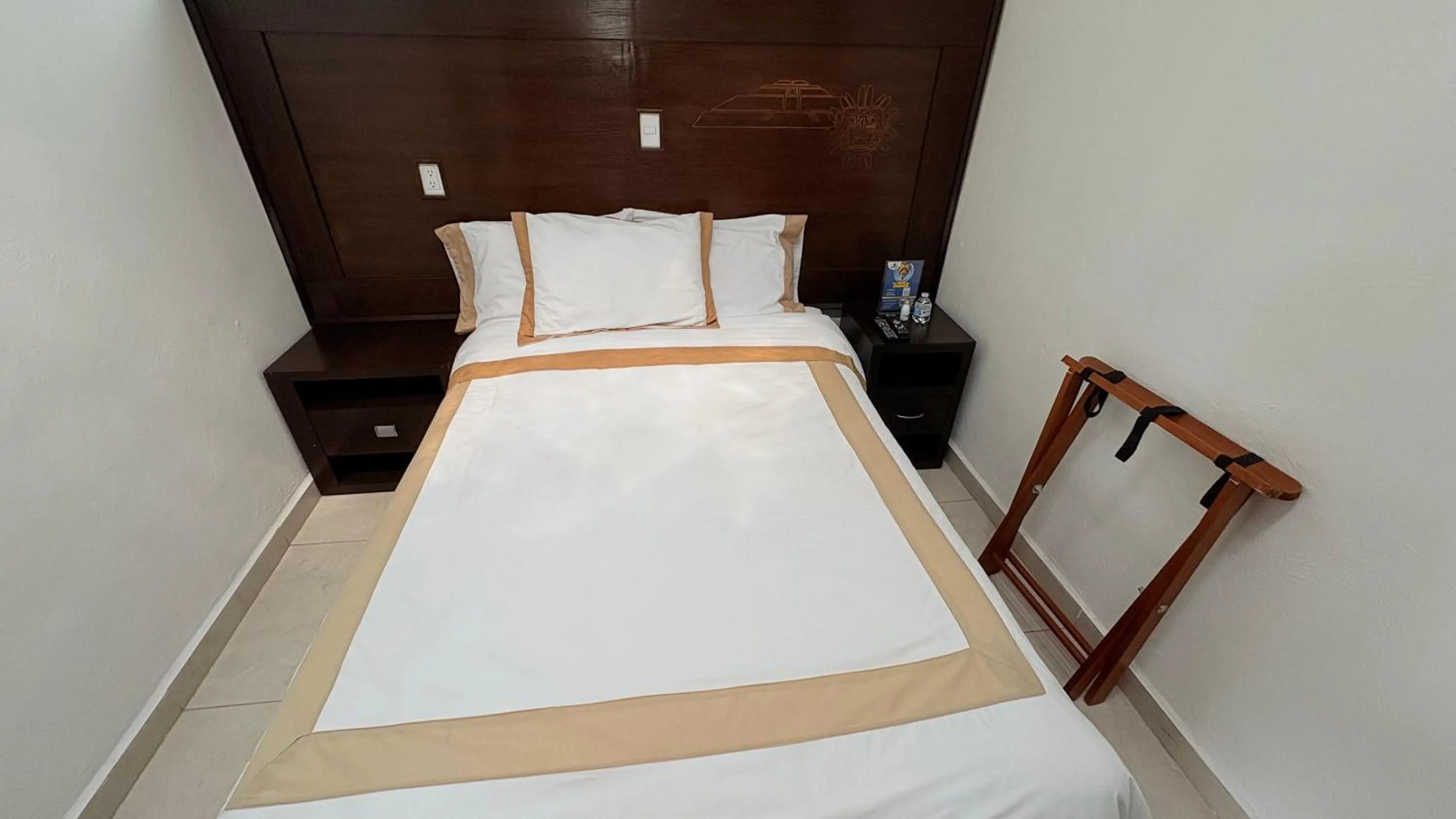 Bed in Hotel Boutique Yaocalli