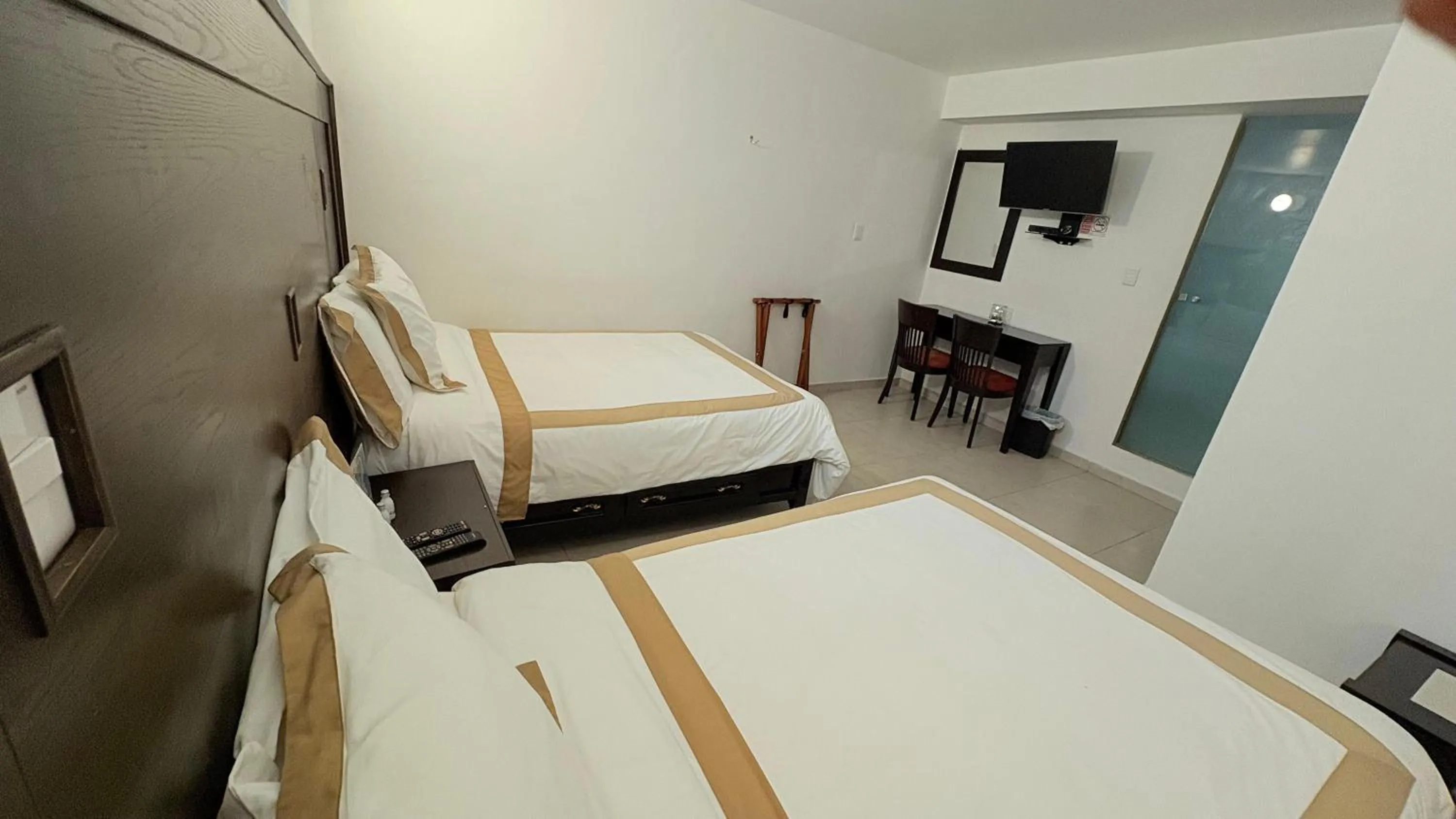 Bed in Hotel Boutique Yaocalli