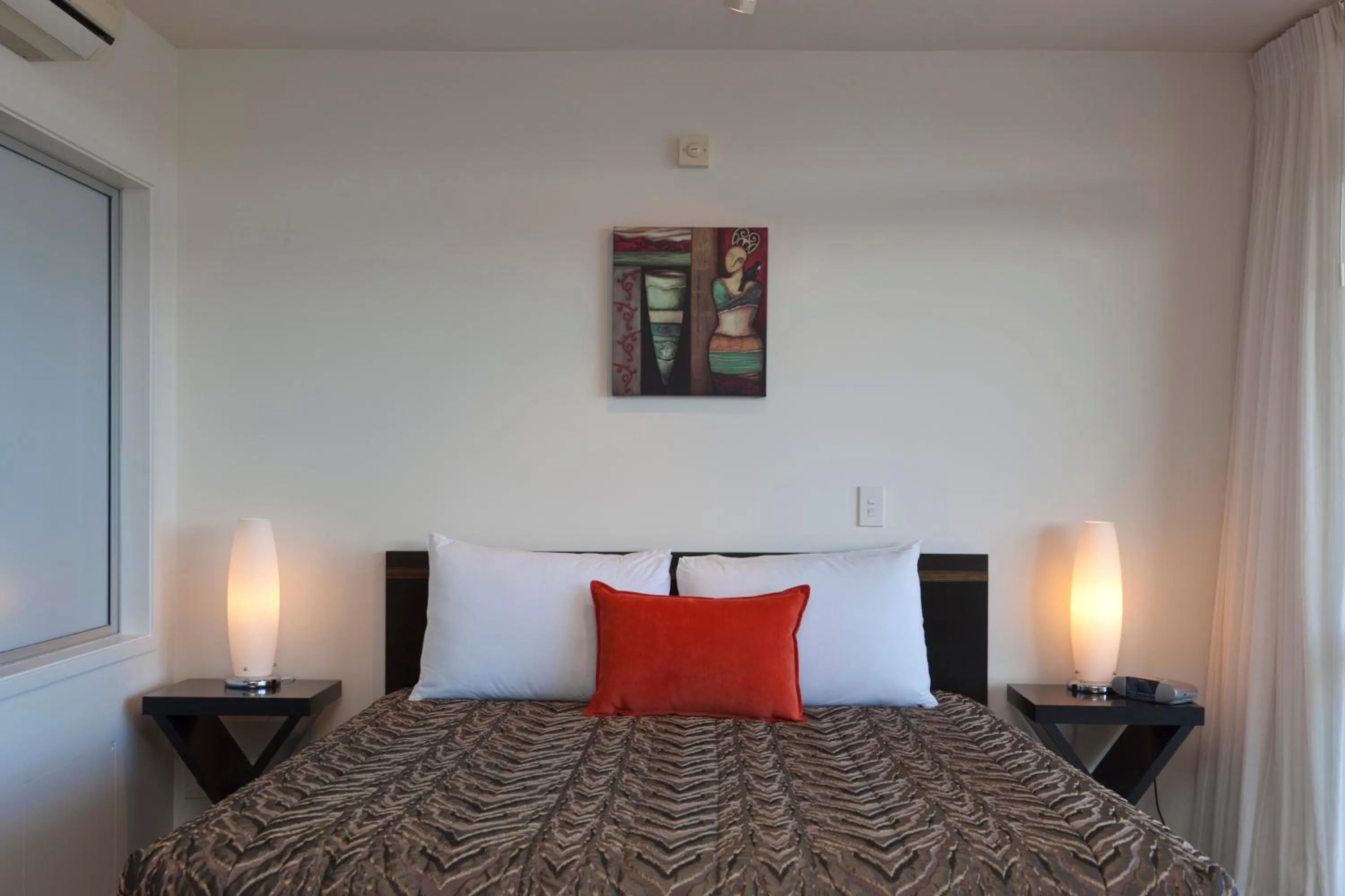 Bed in The Reef Resort